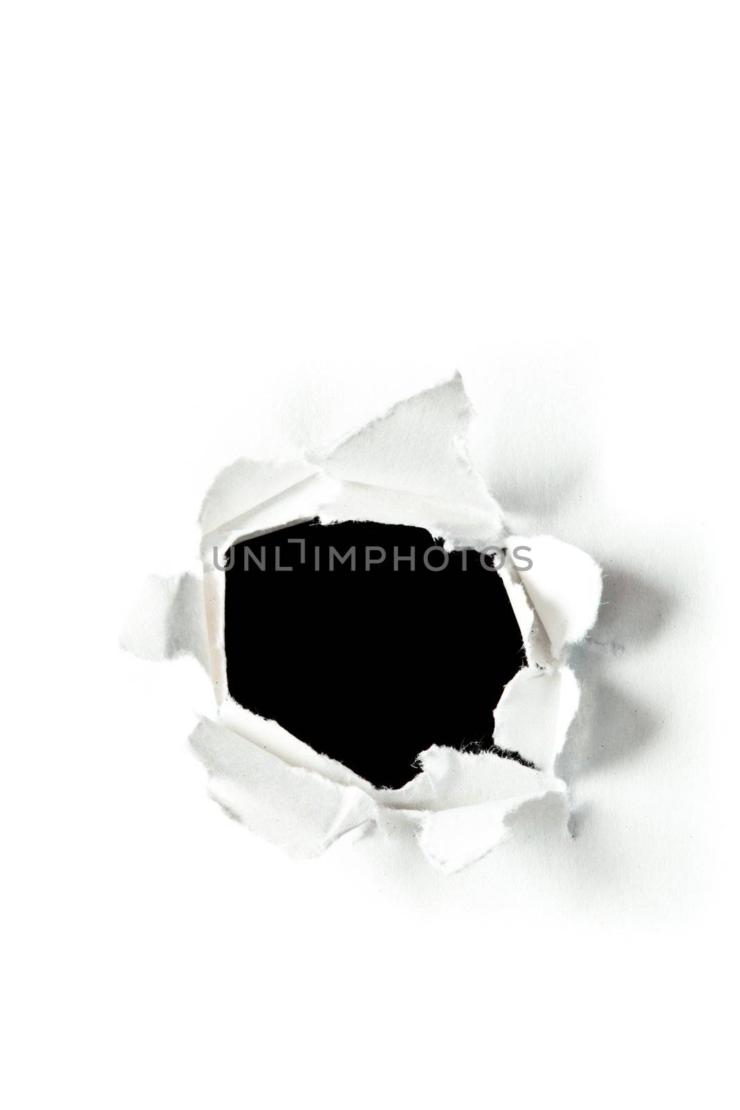 Circle hole in paper by Wavebreakmedia