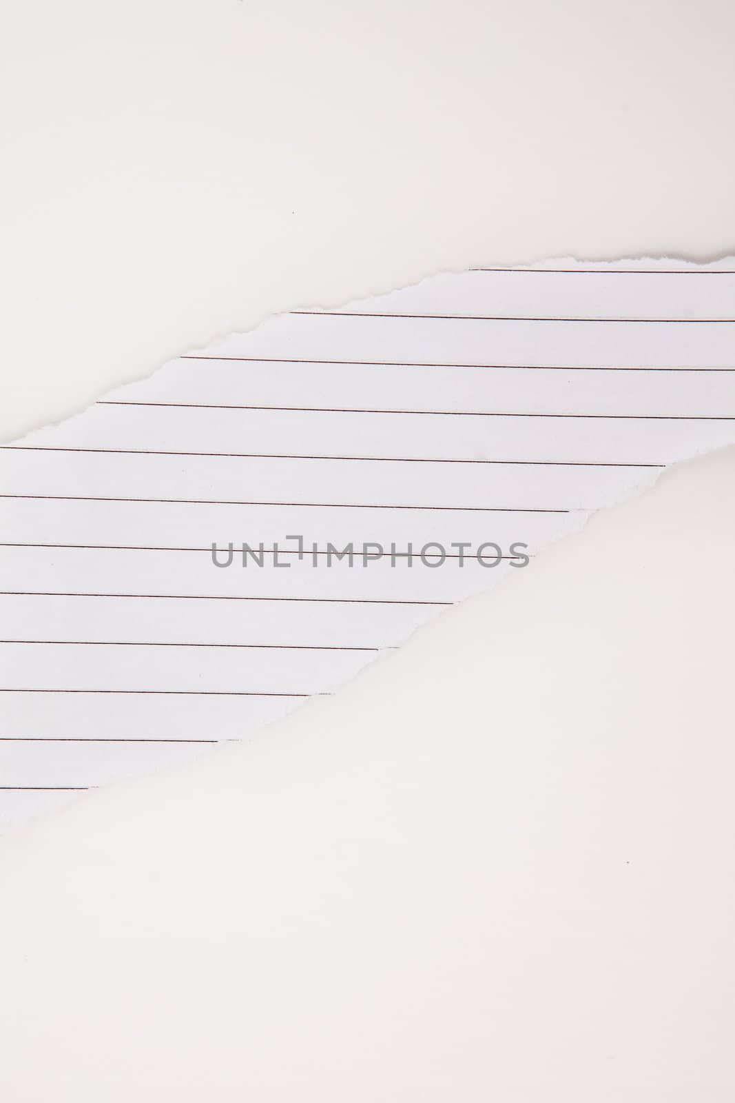 Paper blank tearing against a white background