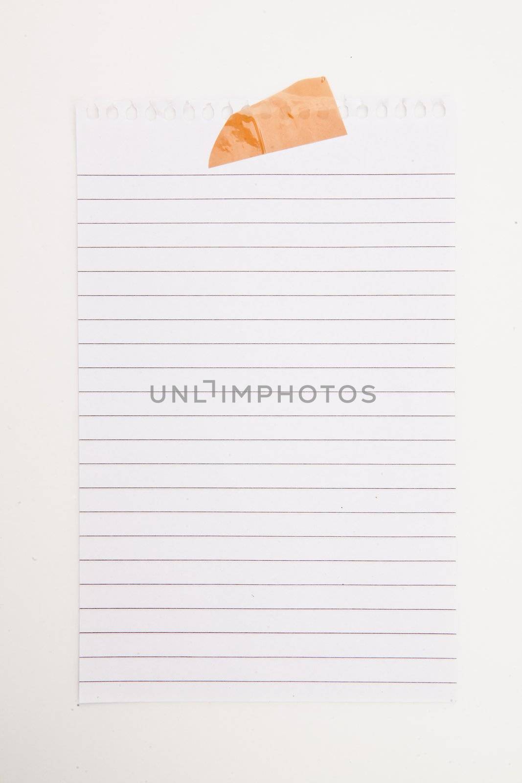 Paper blank with adhesive tape against a white background