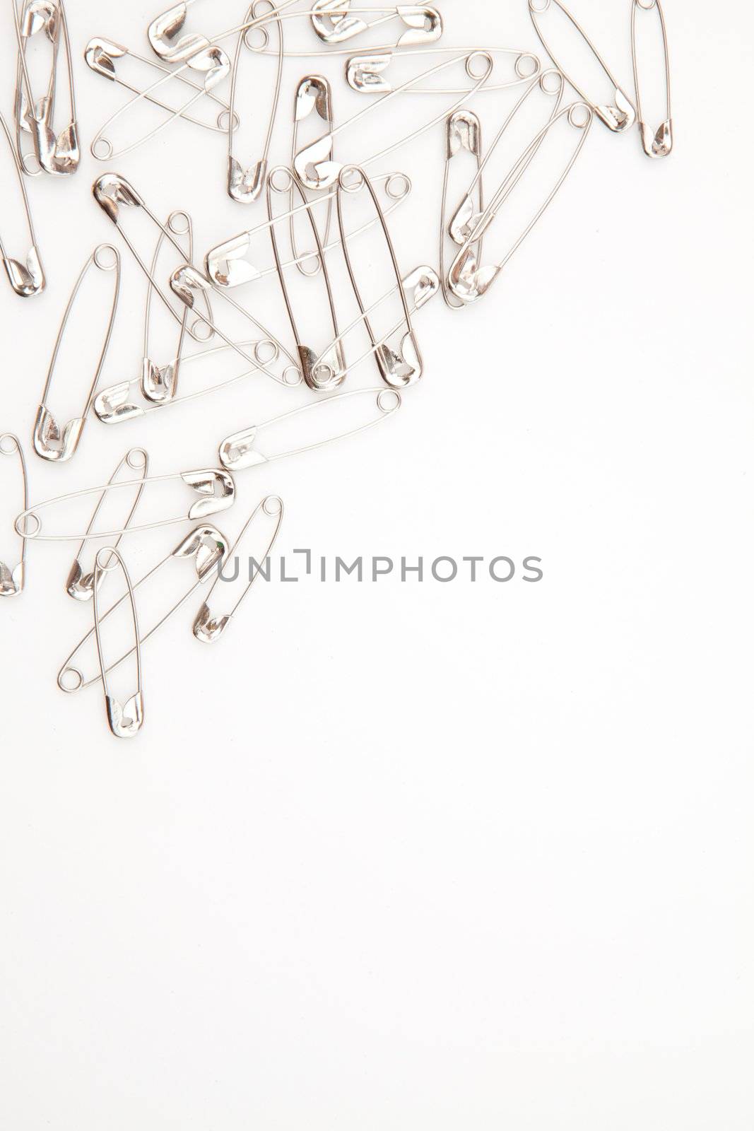 Grey paperclips against a  white background