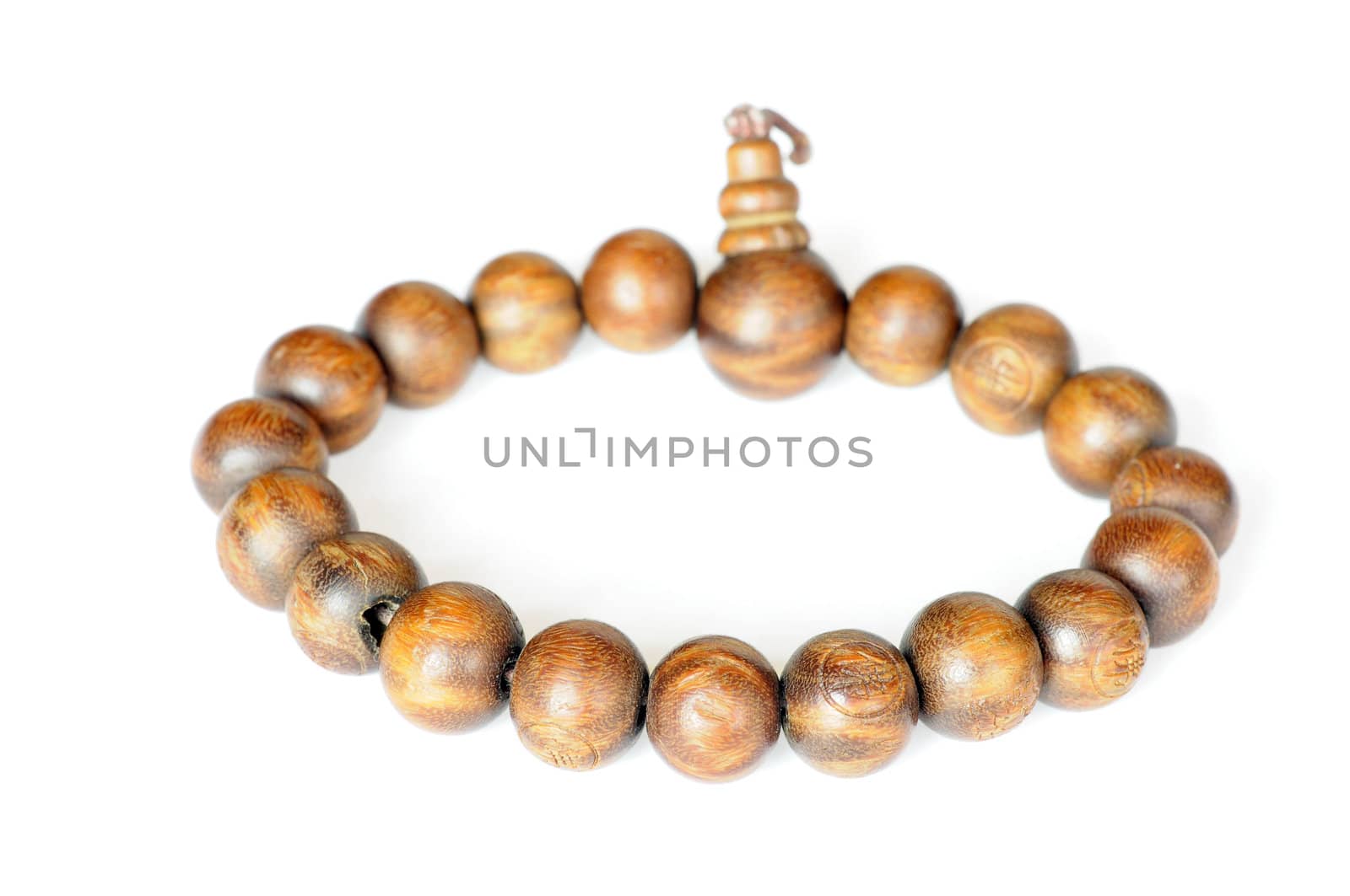 Wooden buddhist beads on a white background