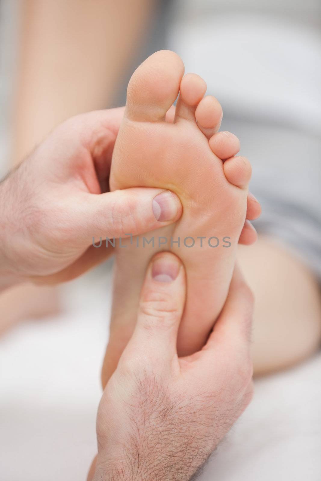 Reflexology massage being made by Wavebreakmedia