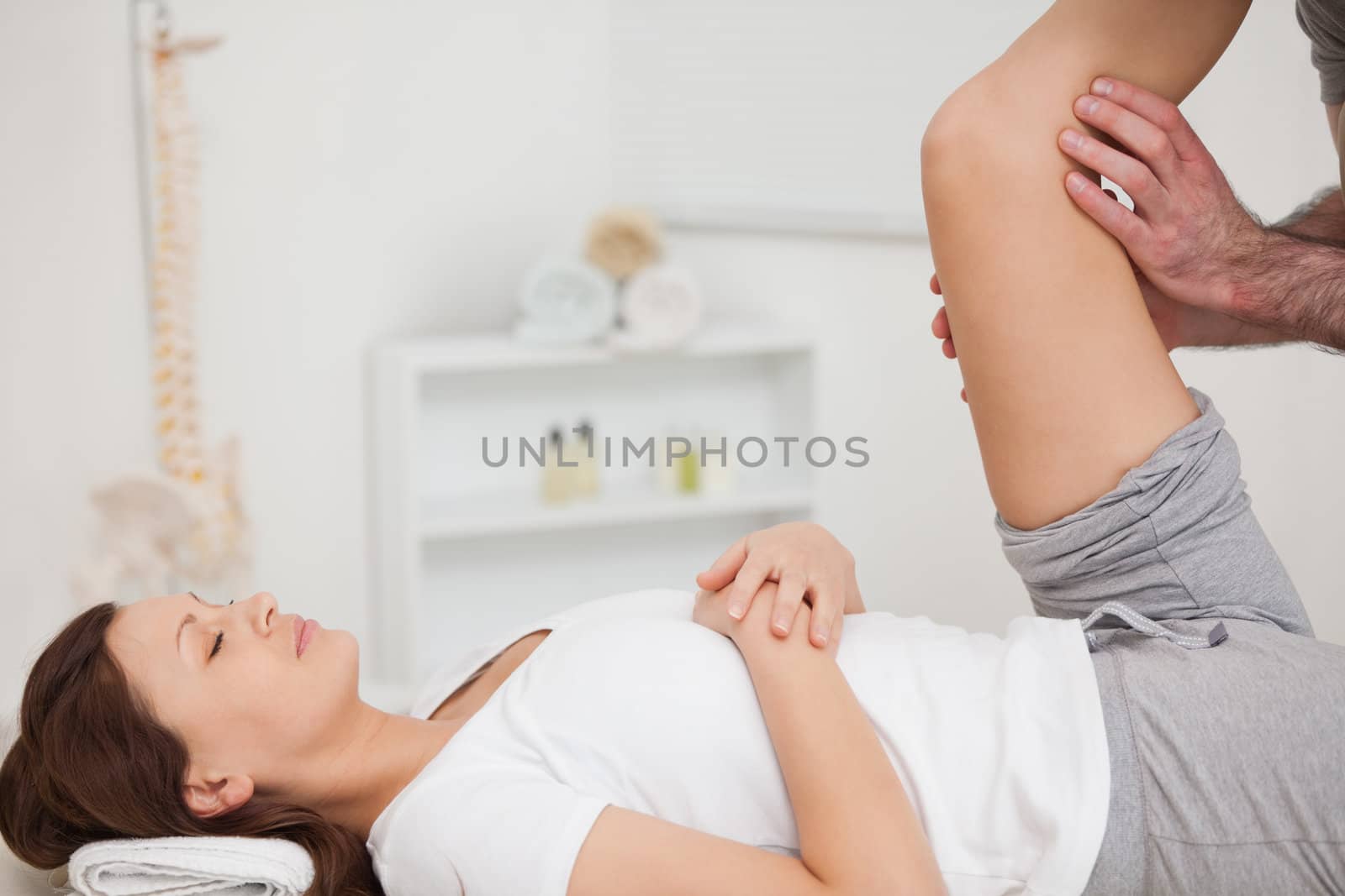 Peaceful patient being stretched by a doctor by Wavebreakmedia