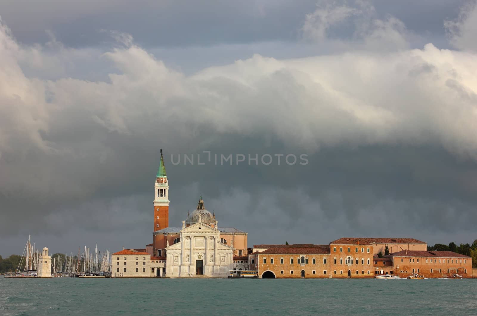 Church of San Giorgio Maggiore in Venice bathing in warm light after the storm.