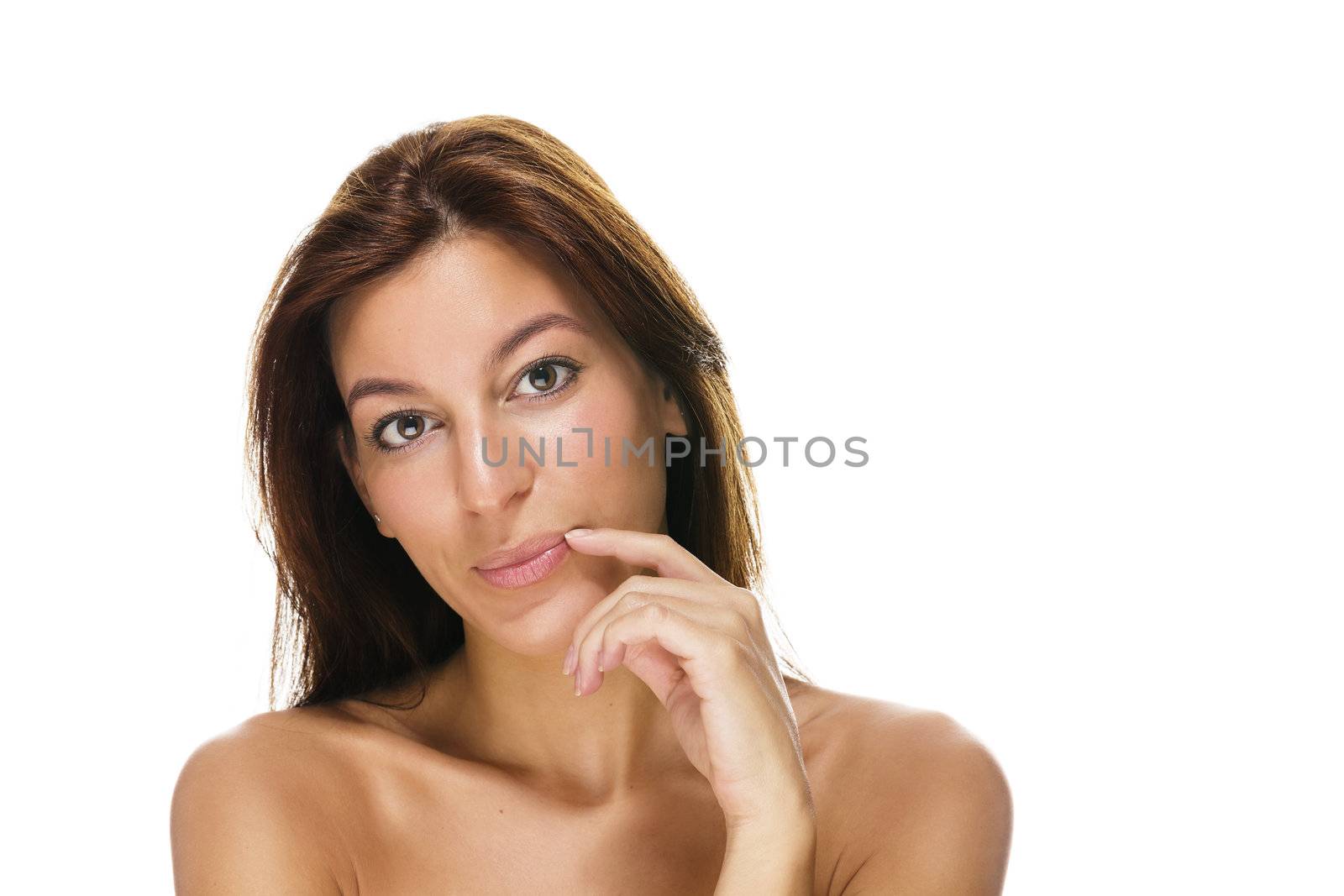 beautiful brunette woman with finger at her lips on white background