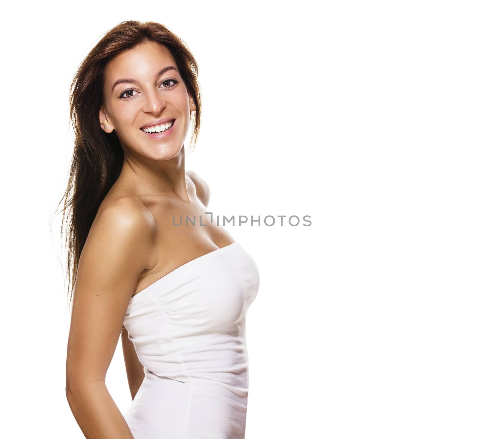 happy brunette woman turning around on white background