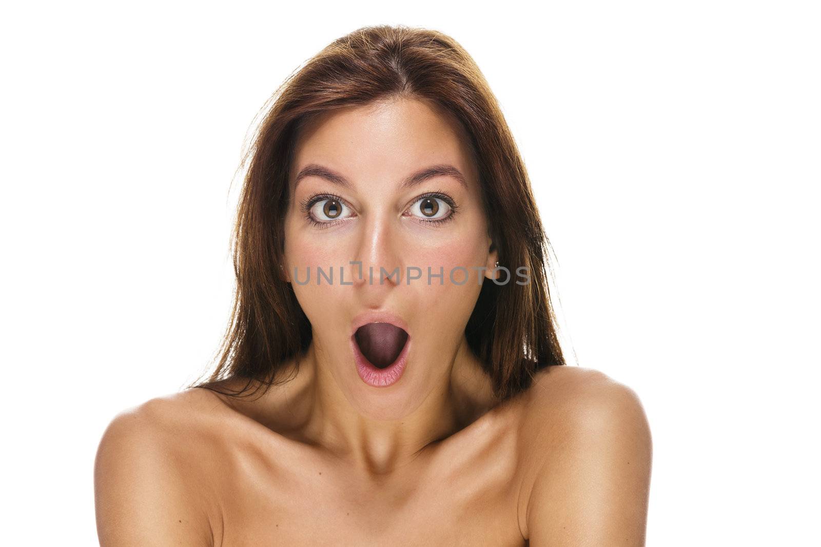 beautiful surprised brunette woman on white background
