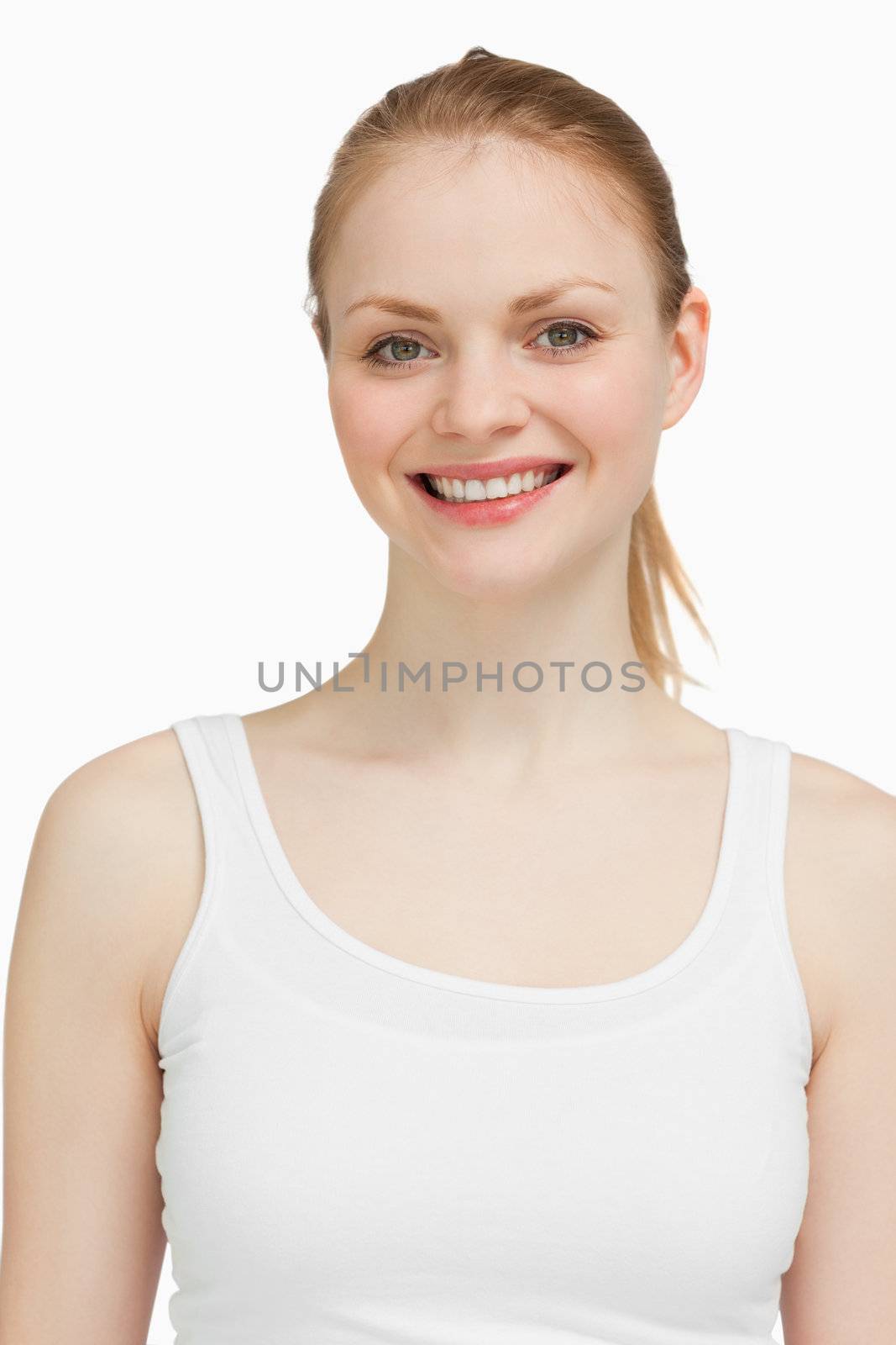 Joyful blonde-haired woman against white background