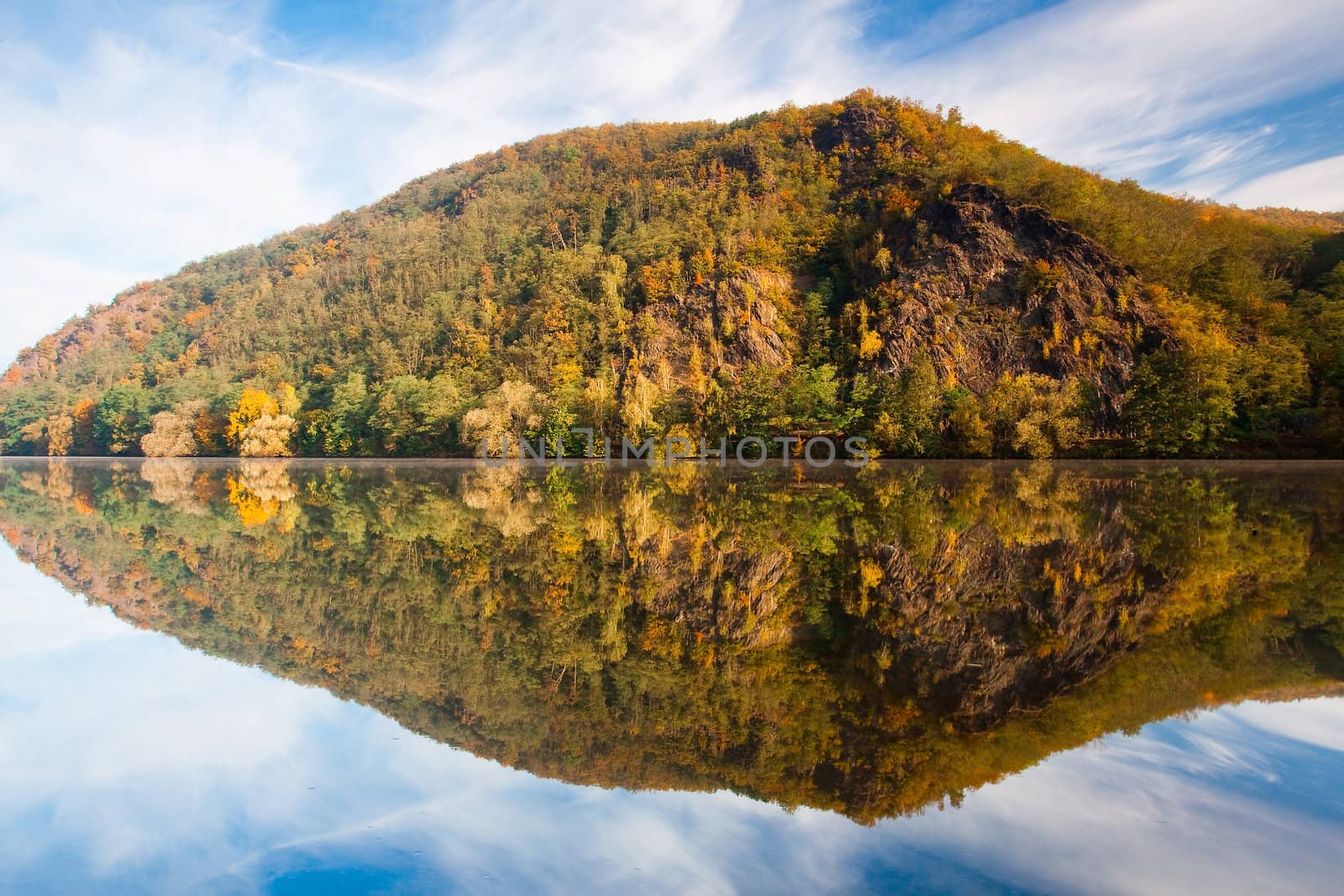 Autumn reflection on the Vltava river in Czech Republic