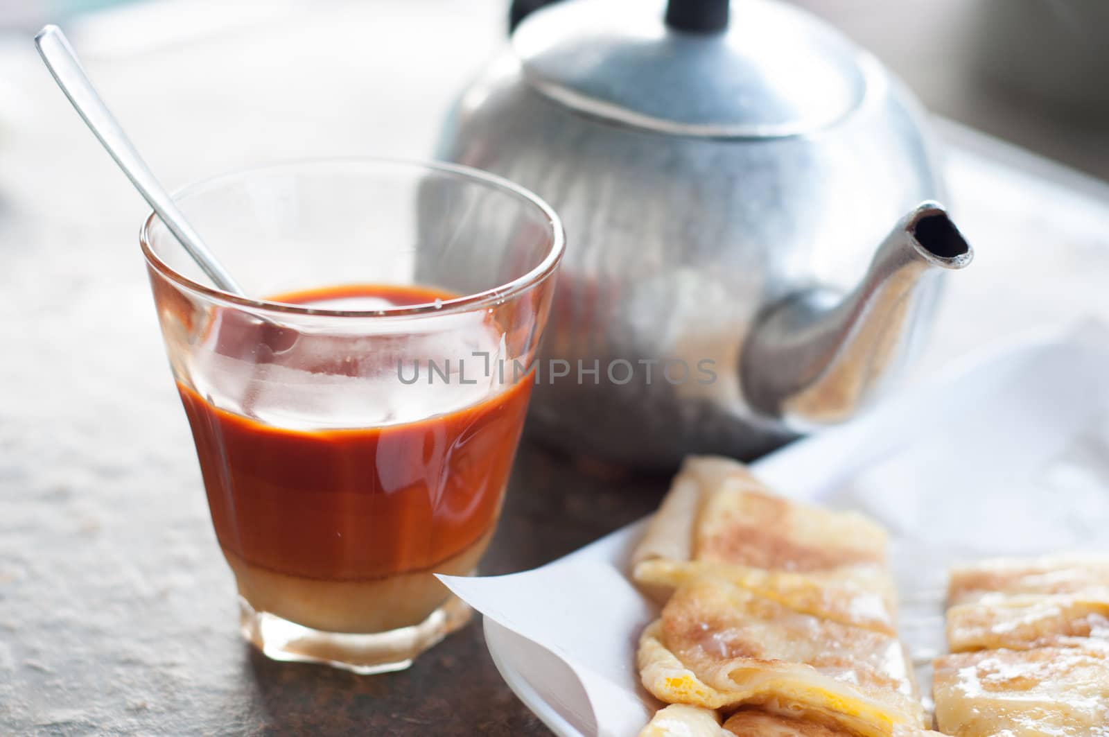 thai hot tea with sweet milk beverage