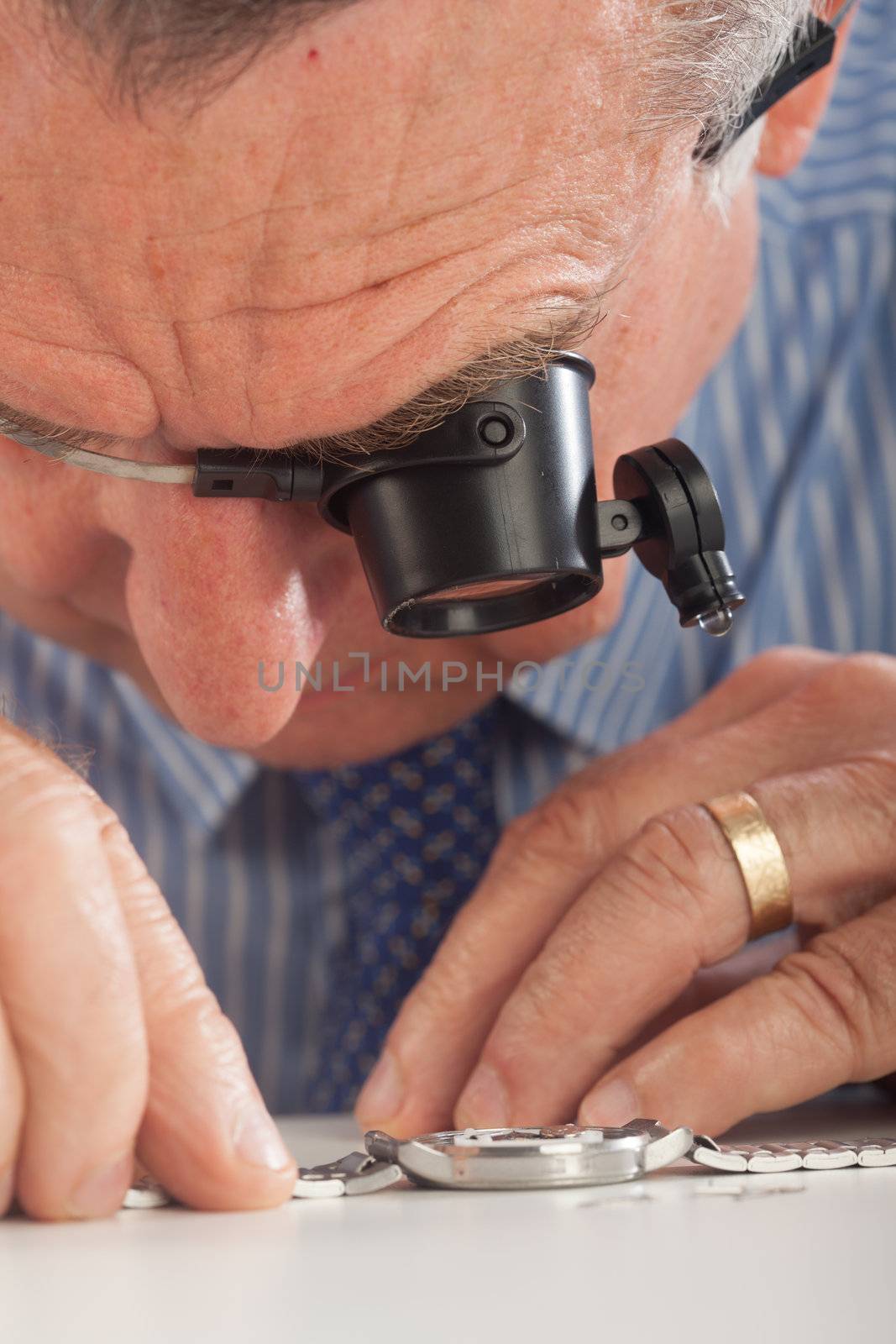 Watchmaker With Magnifying Glasses by Daniel_Wiedemann