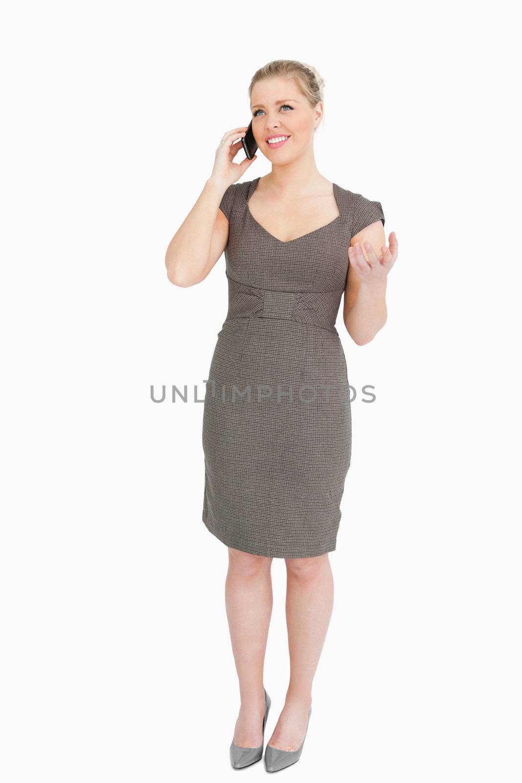 Secretary on the phone against white background