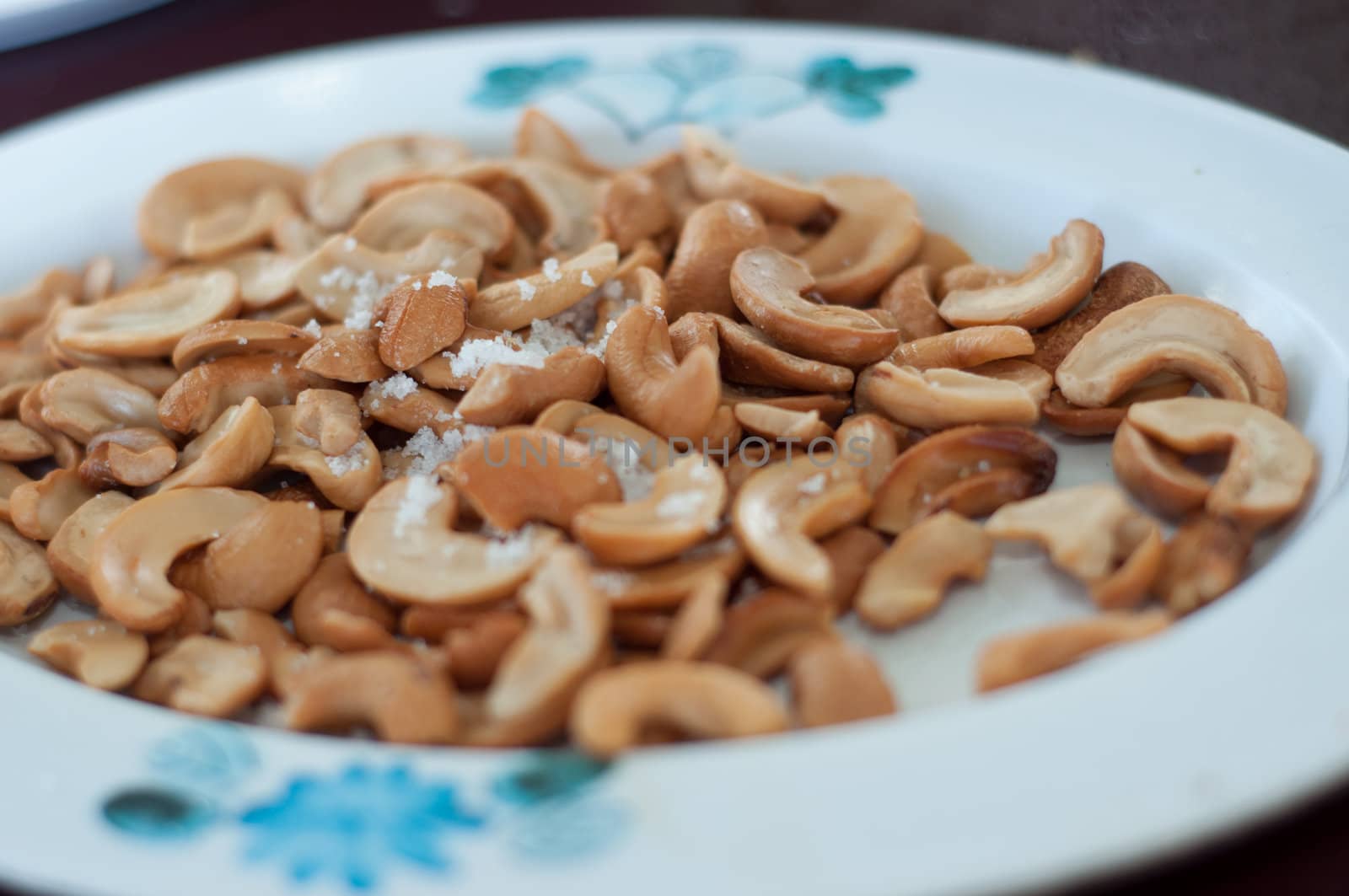 cashew nuts with salt on dish