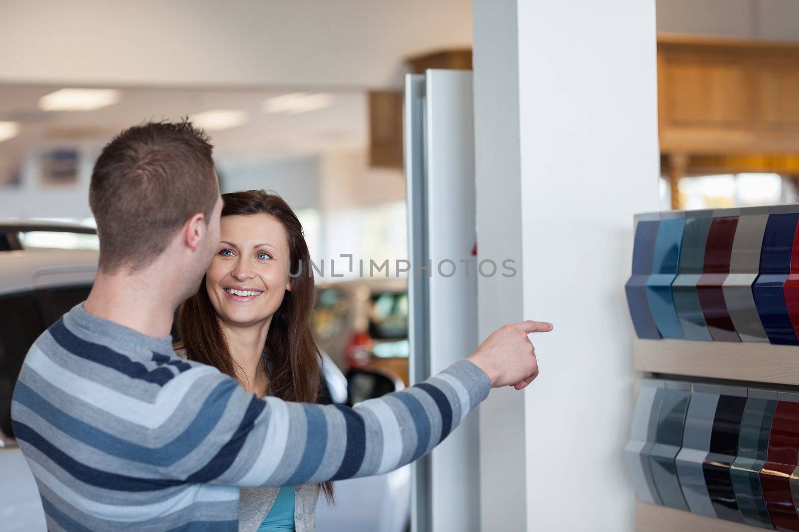 Customers choosing a colour in a store