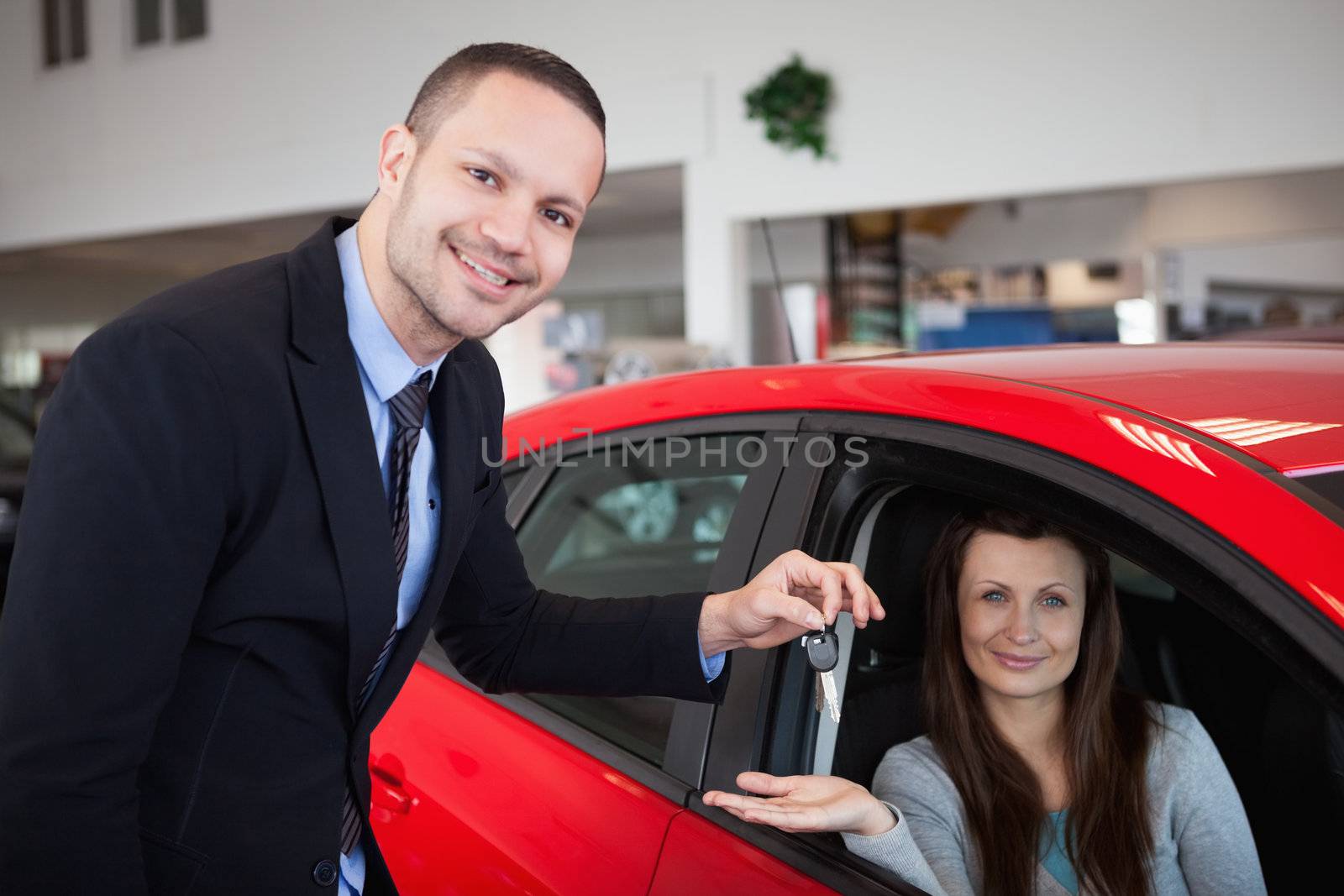 Client being inside the car in a dealership