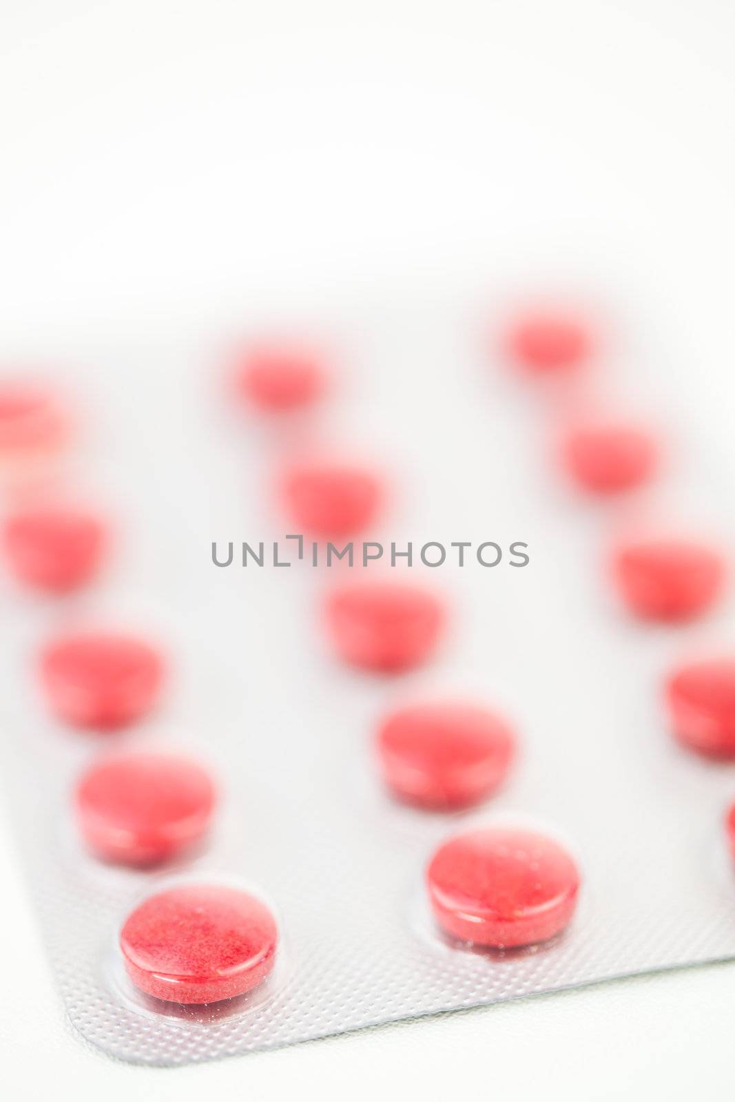 Close up of medication against white background