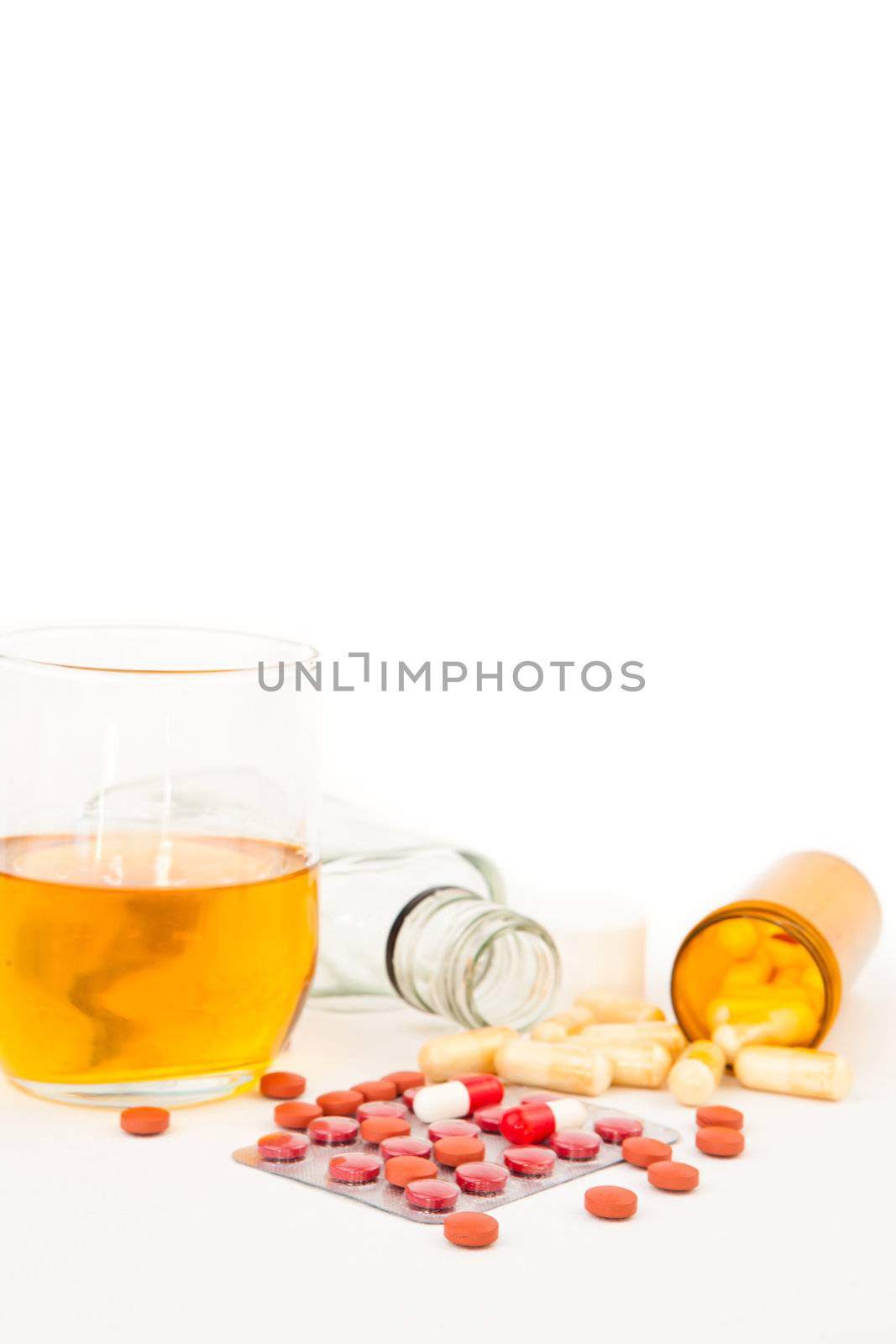 Suicide attempt with a mixture of alcohol and medications by Wavebreakmedia