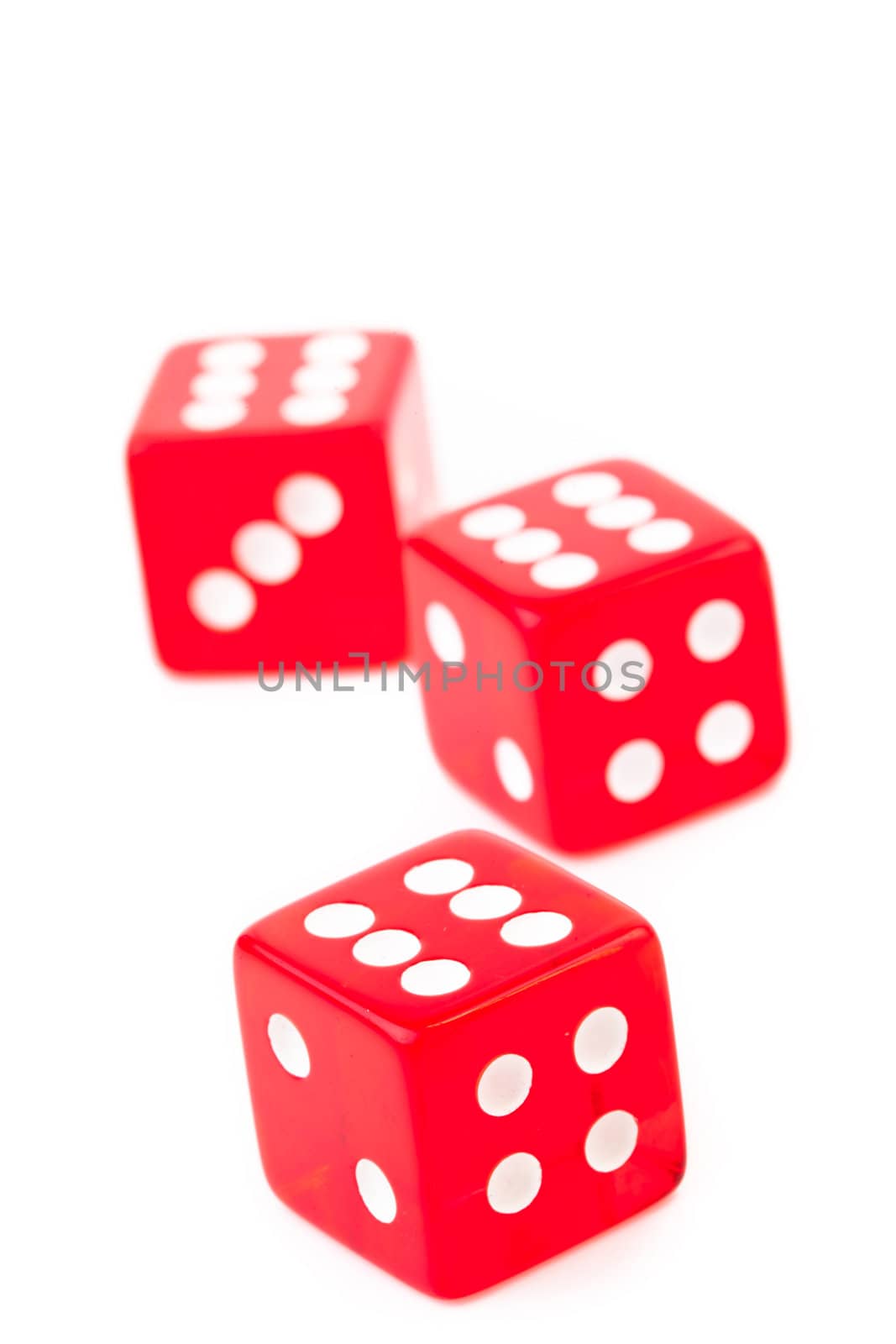 Three dices against a white background