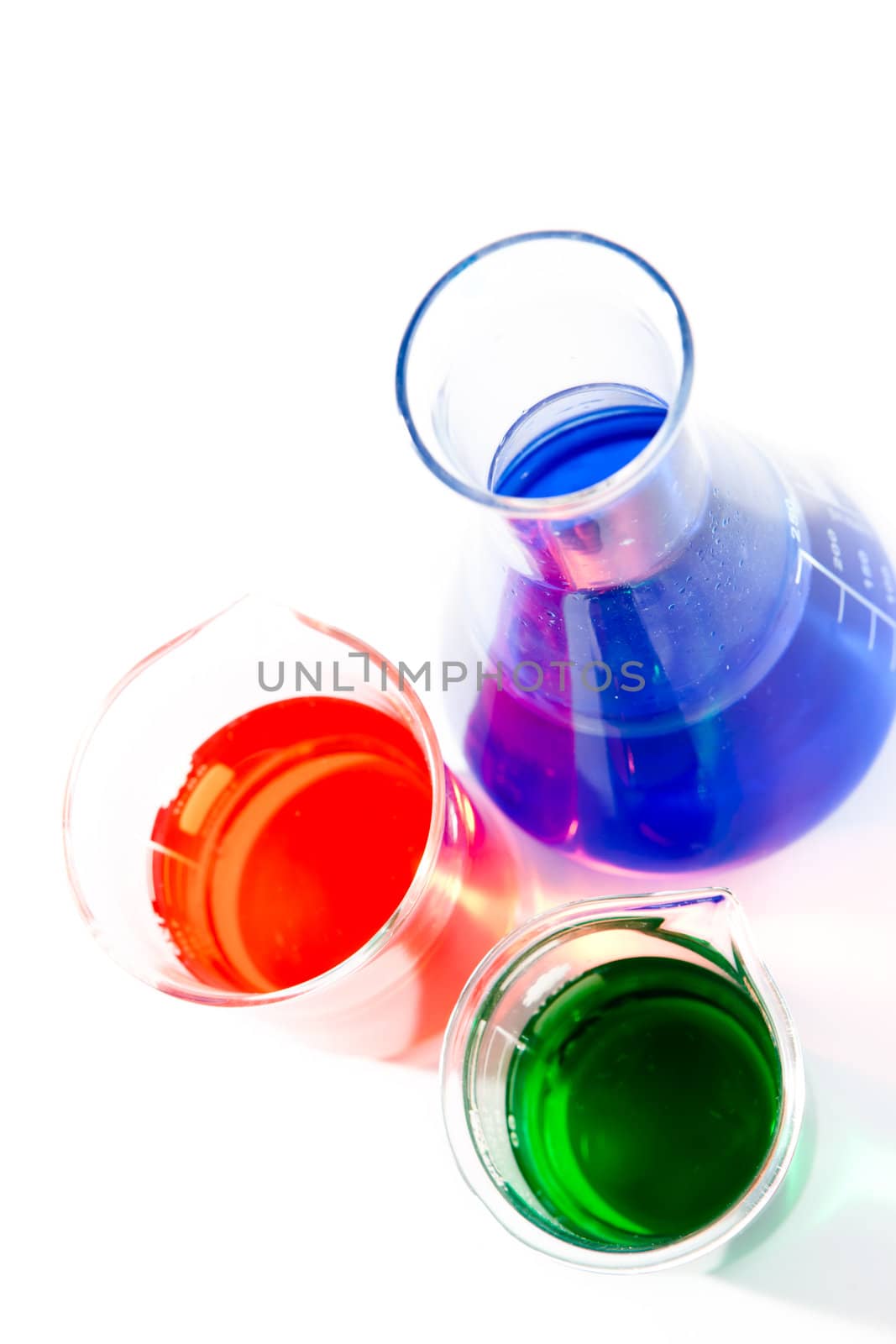 Two beakers and an erlenmeyer against a white background