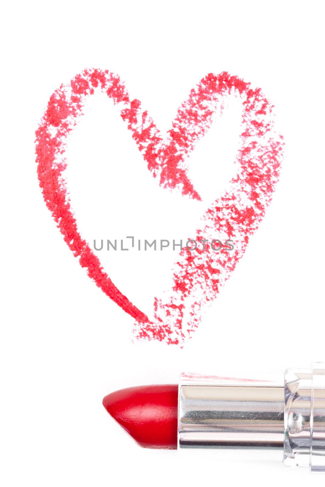 Red trace of lipstick forming a heart against a white background