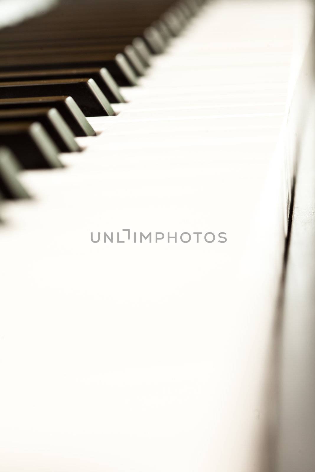 Close up of keys of a piano by Wavebreakmedia