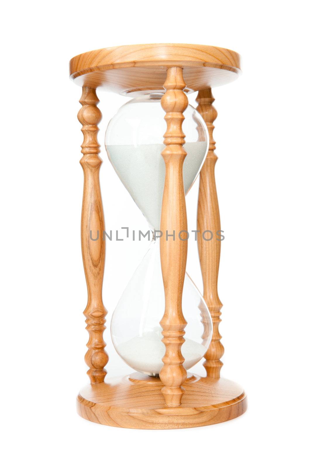 Hourglass in motion against a white background