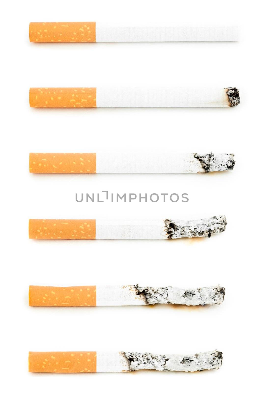 Different cigarettes burning by Wavebreakmedia