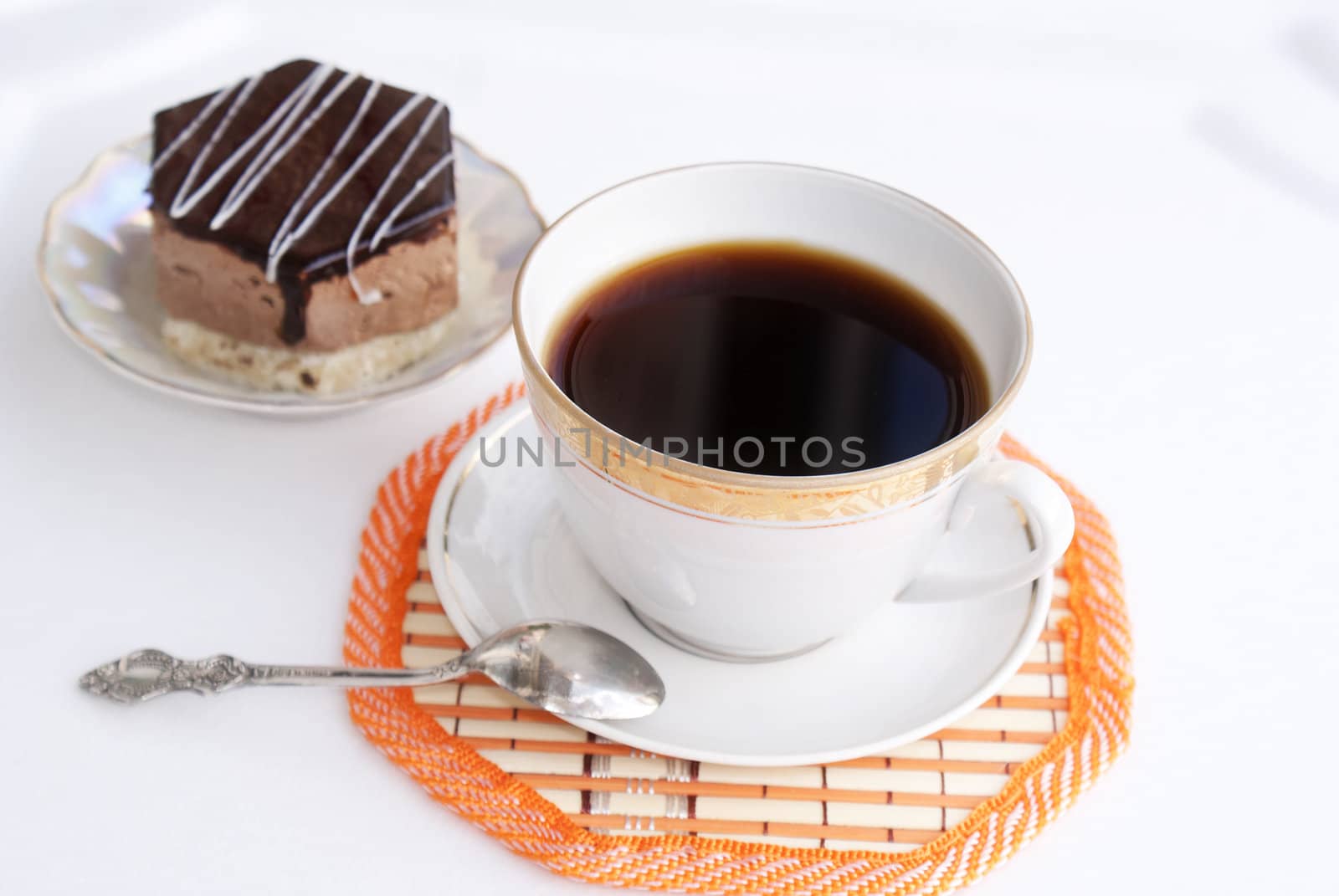 Black morning coffee and fresh sweet chocolate cake