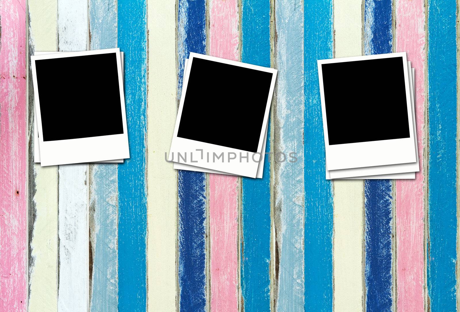 Blank Photos on pastel painting wood background