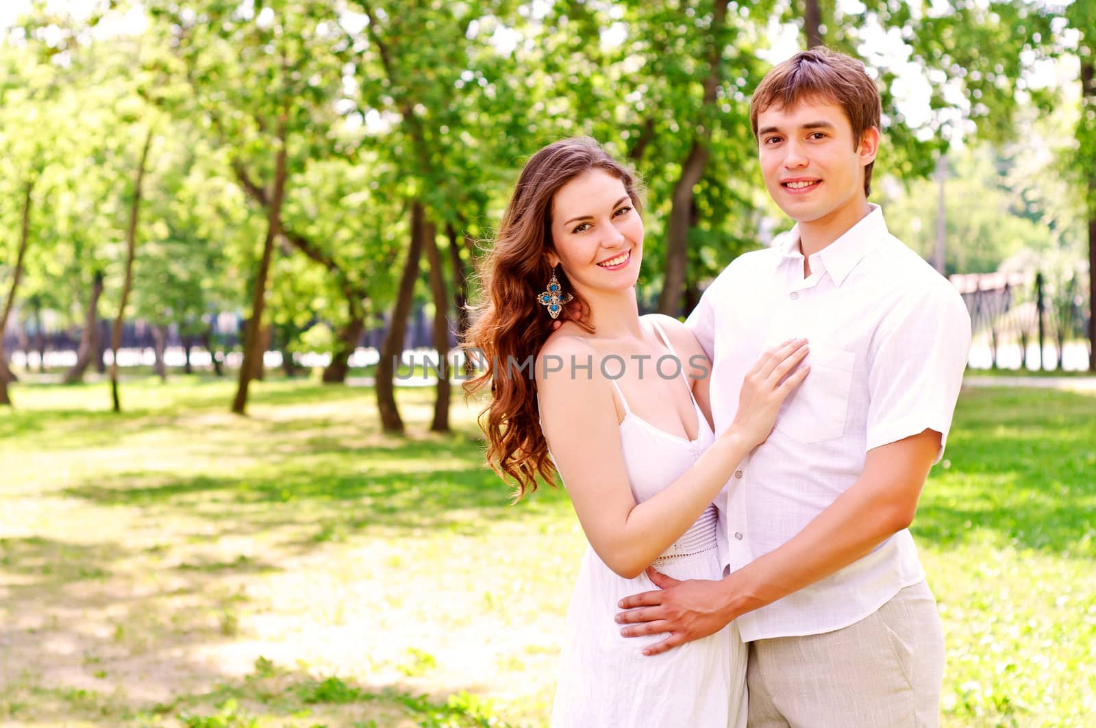 couple hugging in the park, have a good time together