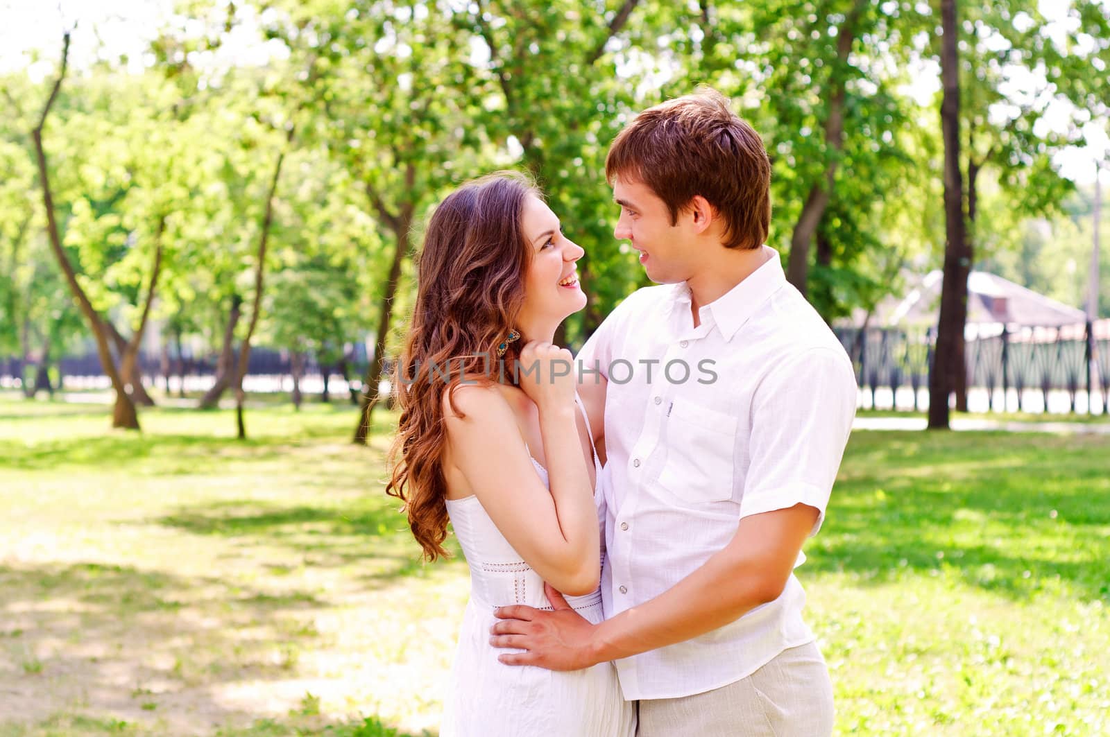 couple hugging in the park, have a good time together