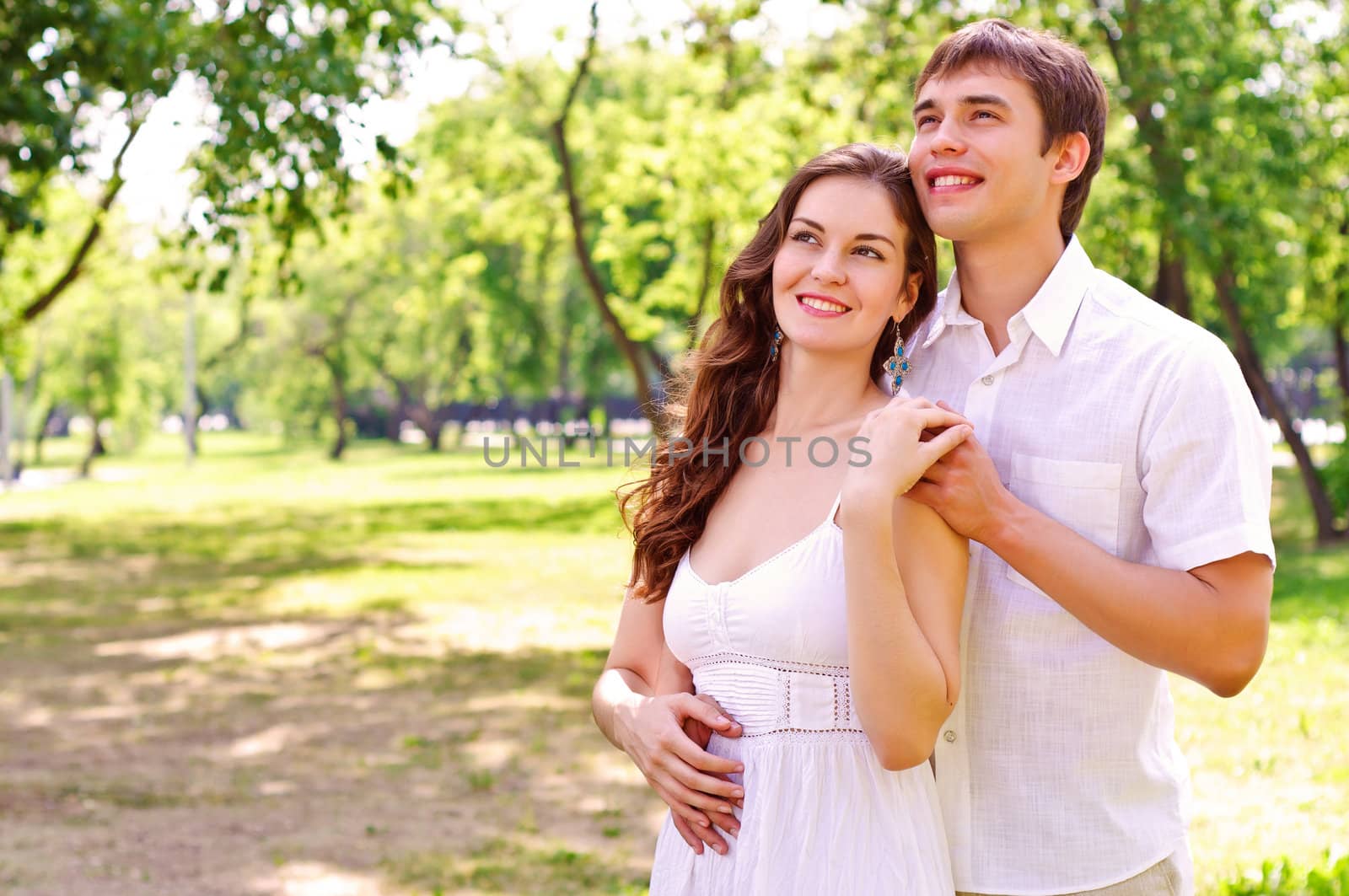 couple hugging in the park, have a good time together