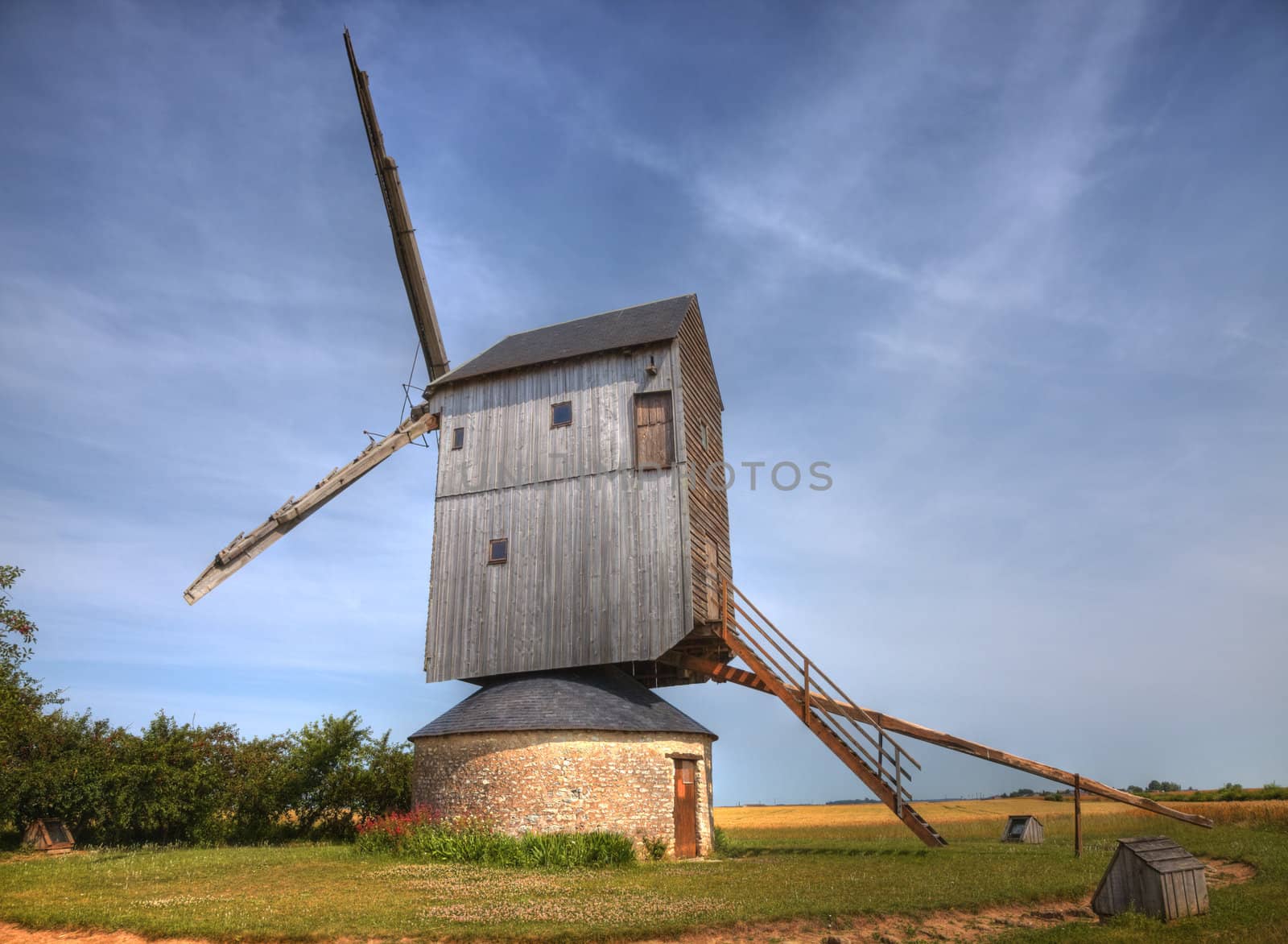 Traditional wooden windmill in France in the Eure &Loir Valley region.This is "moulin Barbier" mill.