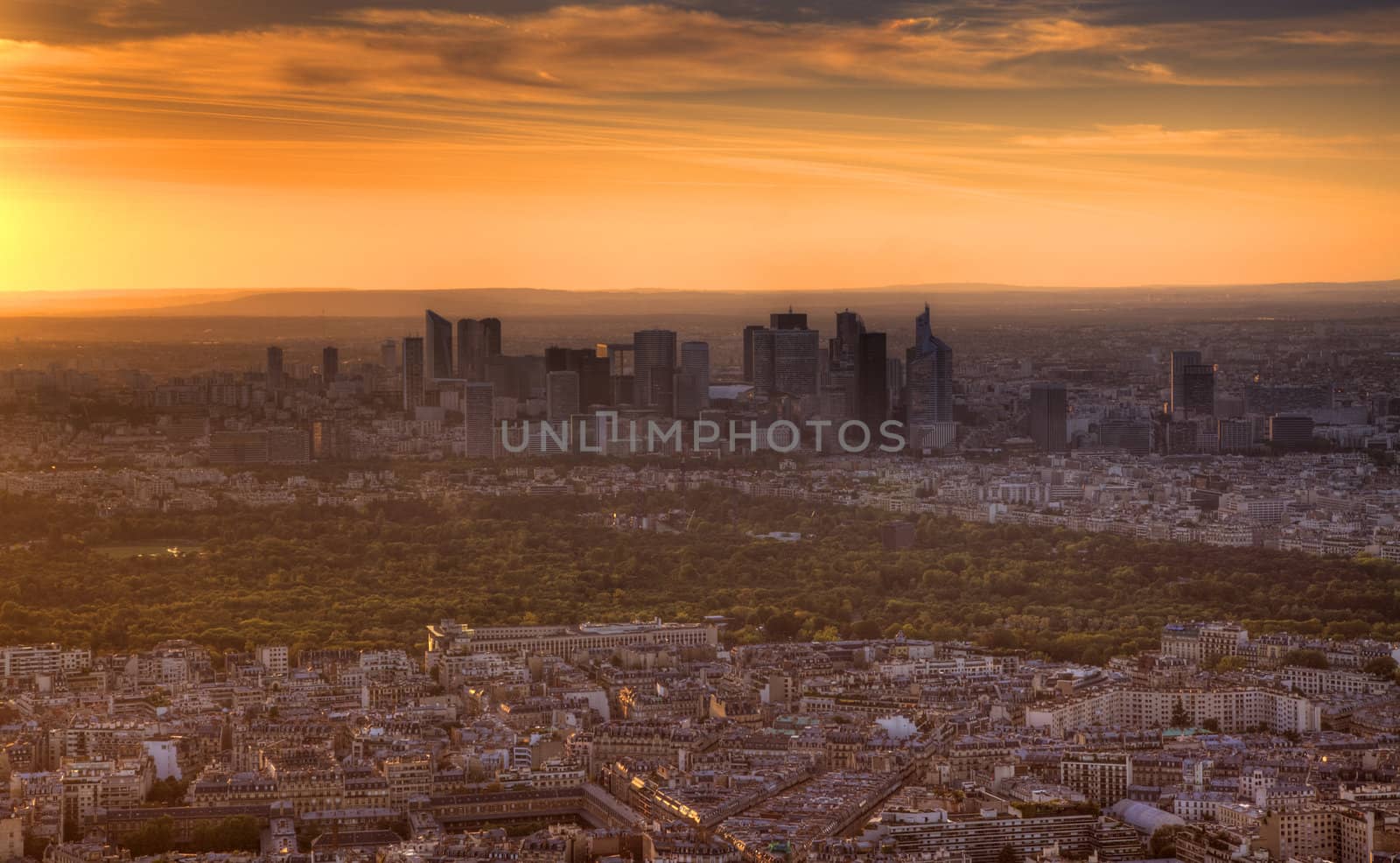 Aerial view of the western part of Paris with La Defense business district at the dusk.