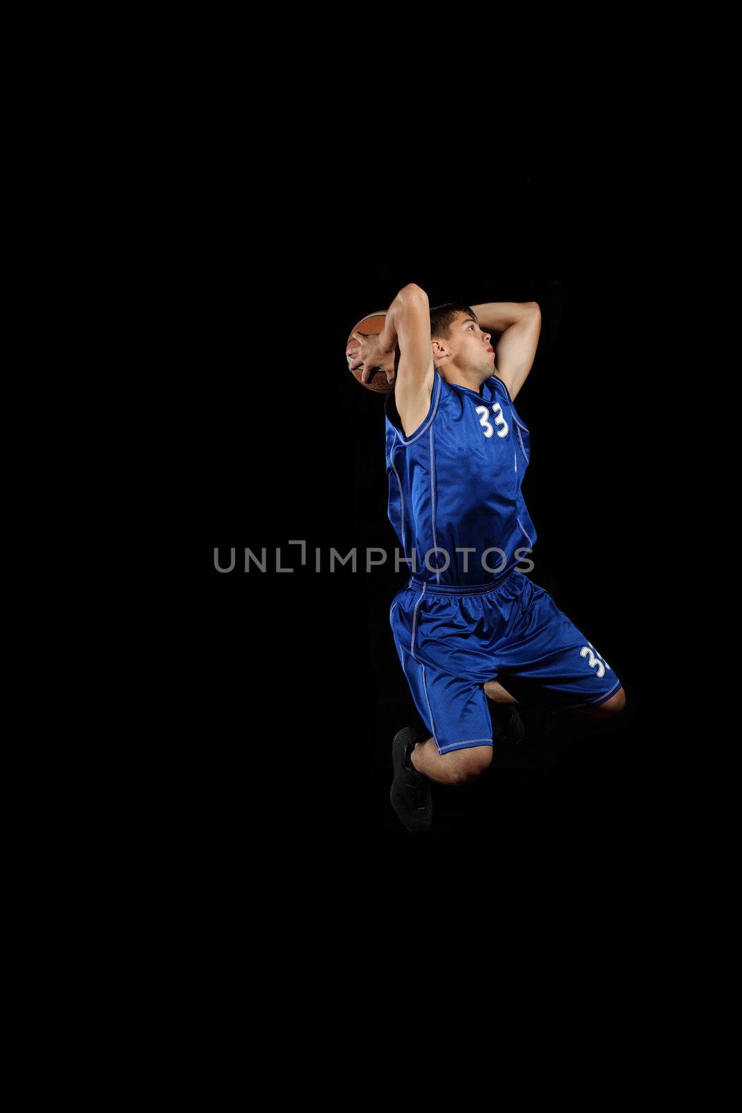 Basketball player with a ball by sergey_nivens