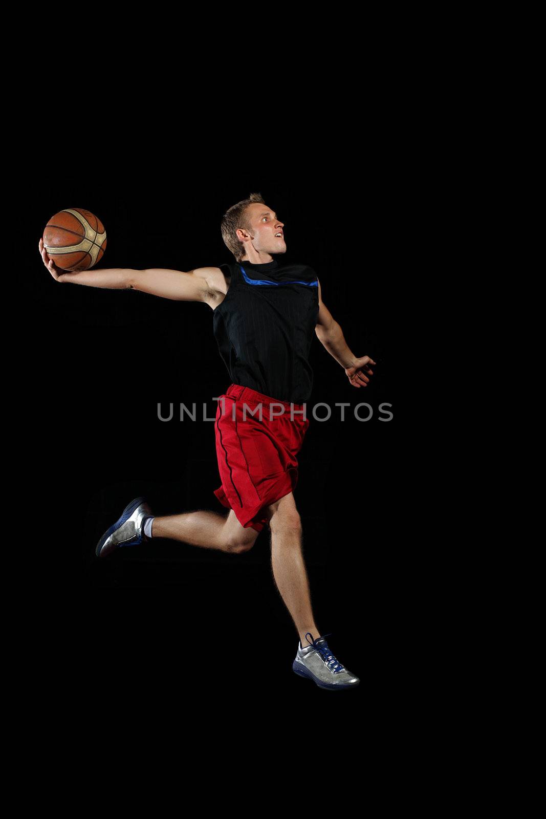 Basketball player with a ball by sergey_nivens