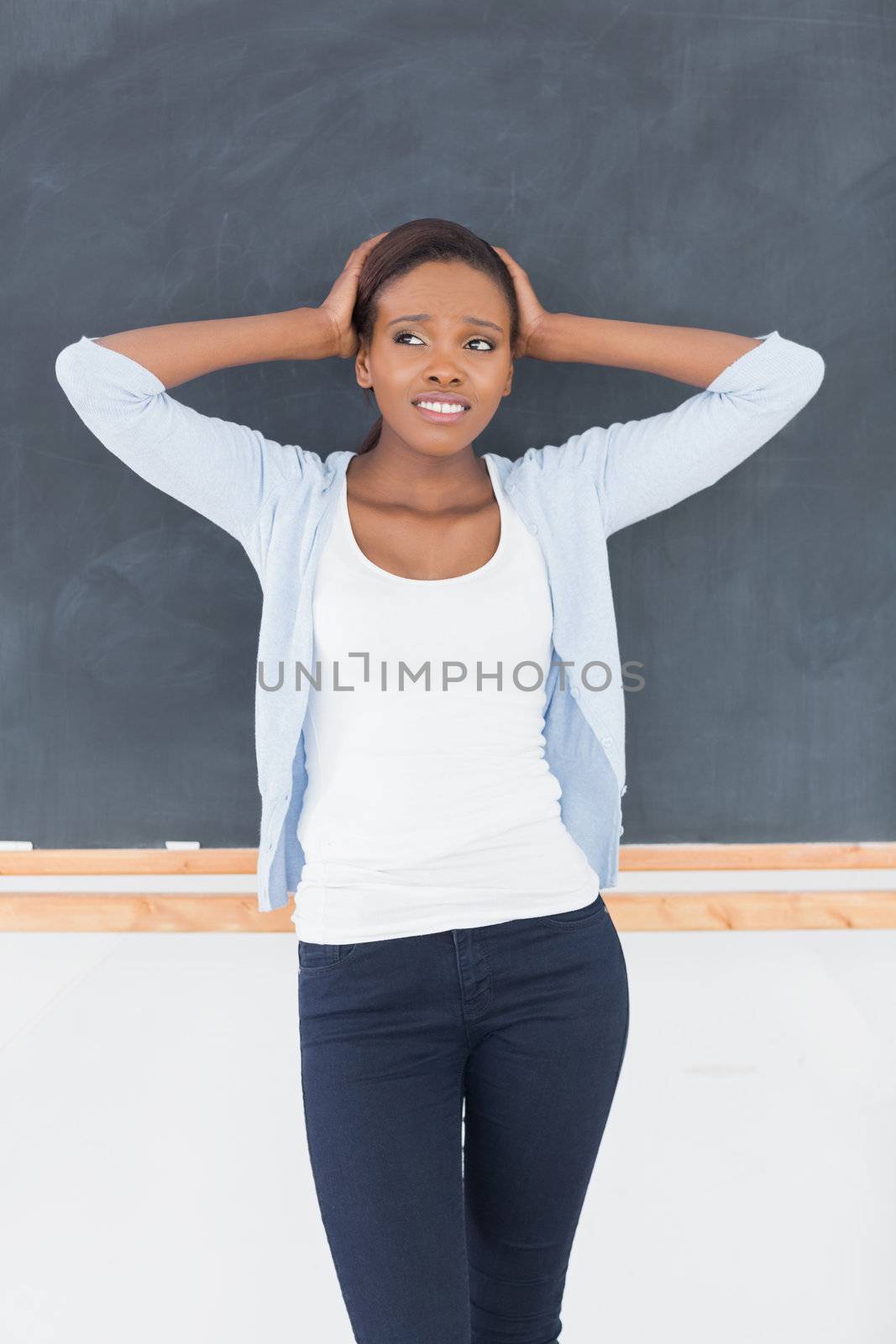 Black woman upset in a classroom