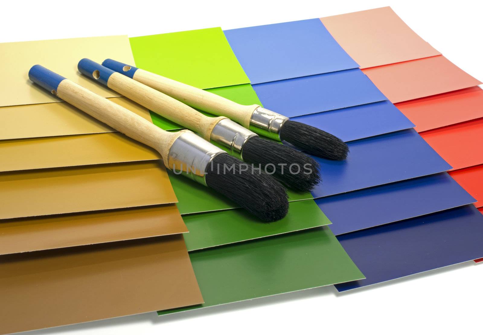 blue green red color samples of painting with paintbrush