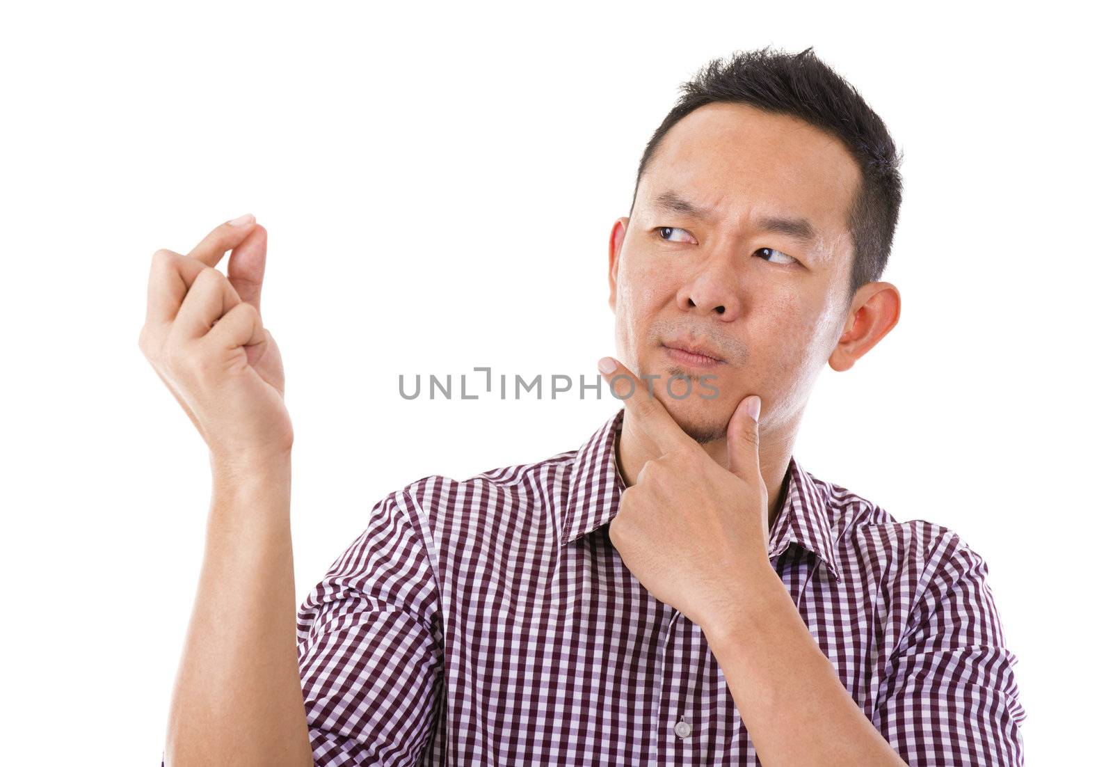 Asian man hand holding blank sign with unsure face expression, isolated over white background