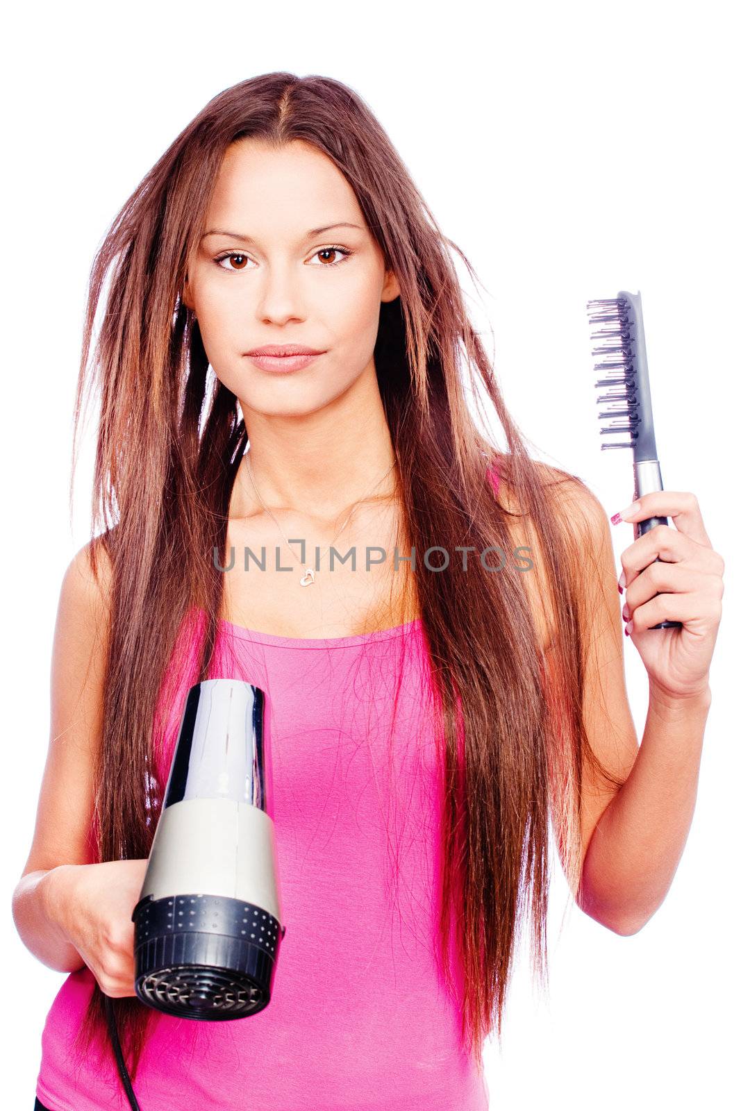 woman with long hair holding blow dryer and comb, isolated on white