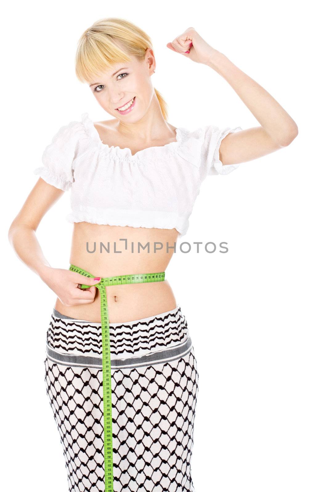 Happy blond woman with measuring tape around waist