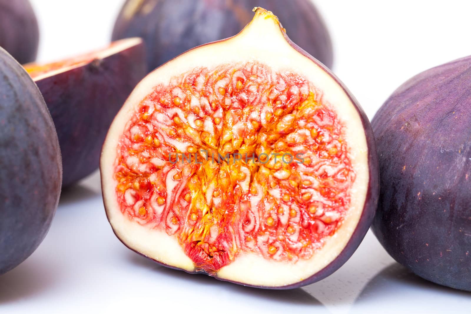 Ripe Fruits Figs on white background