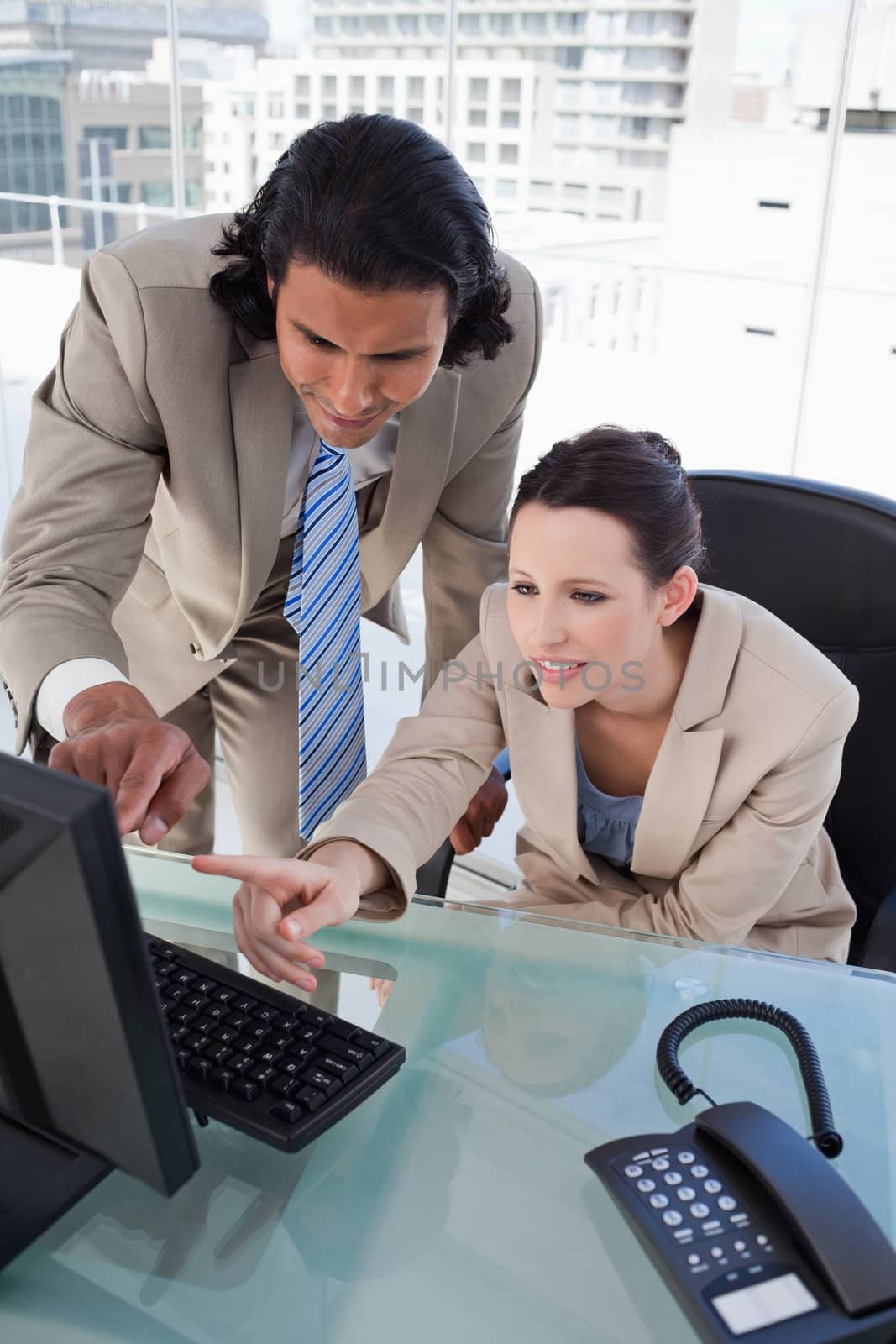 Portrait of a focused business team using a computer by Wavebreakmedia