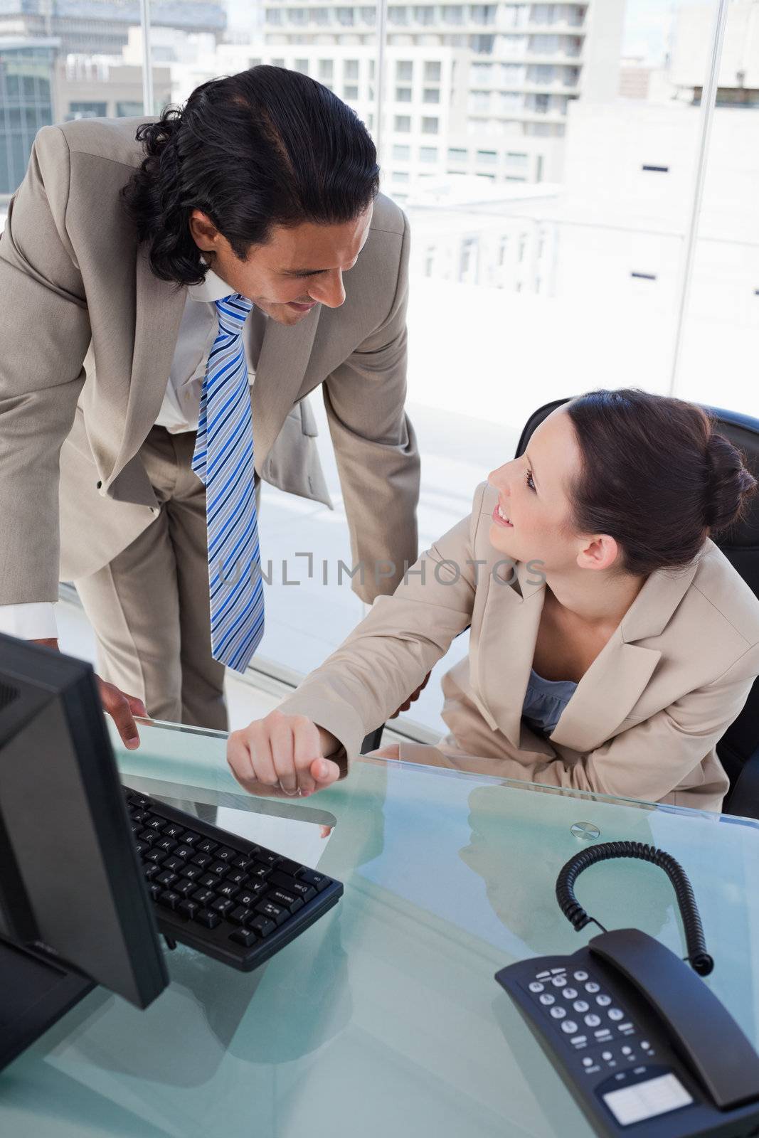 Portrait of a beautiful business team using a computer in an office