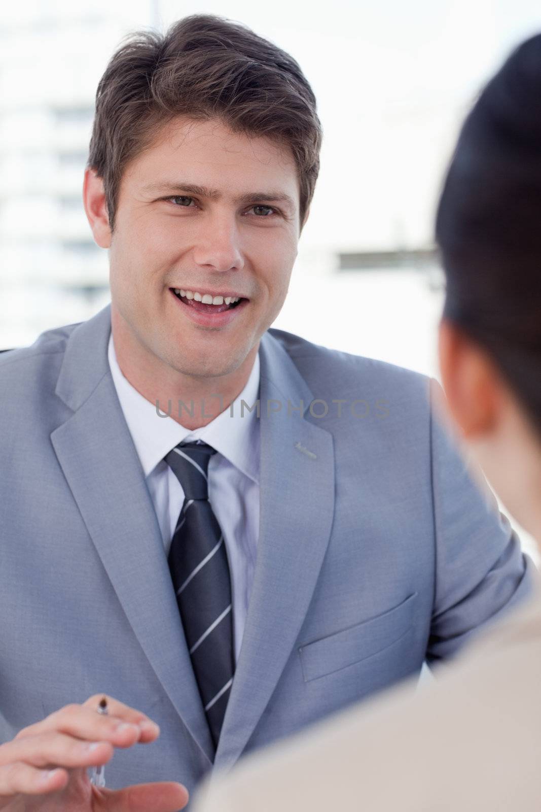 Portrait of a smiling manager interviewing a female applicant by Wavebreakmedia