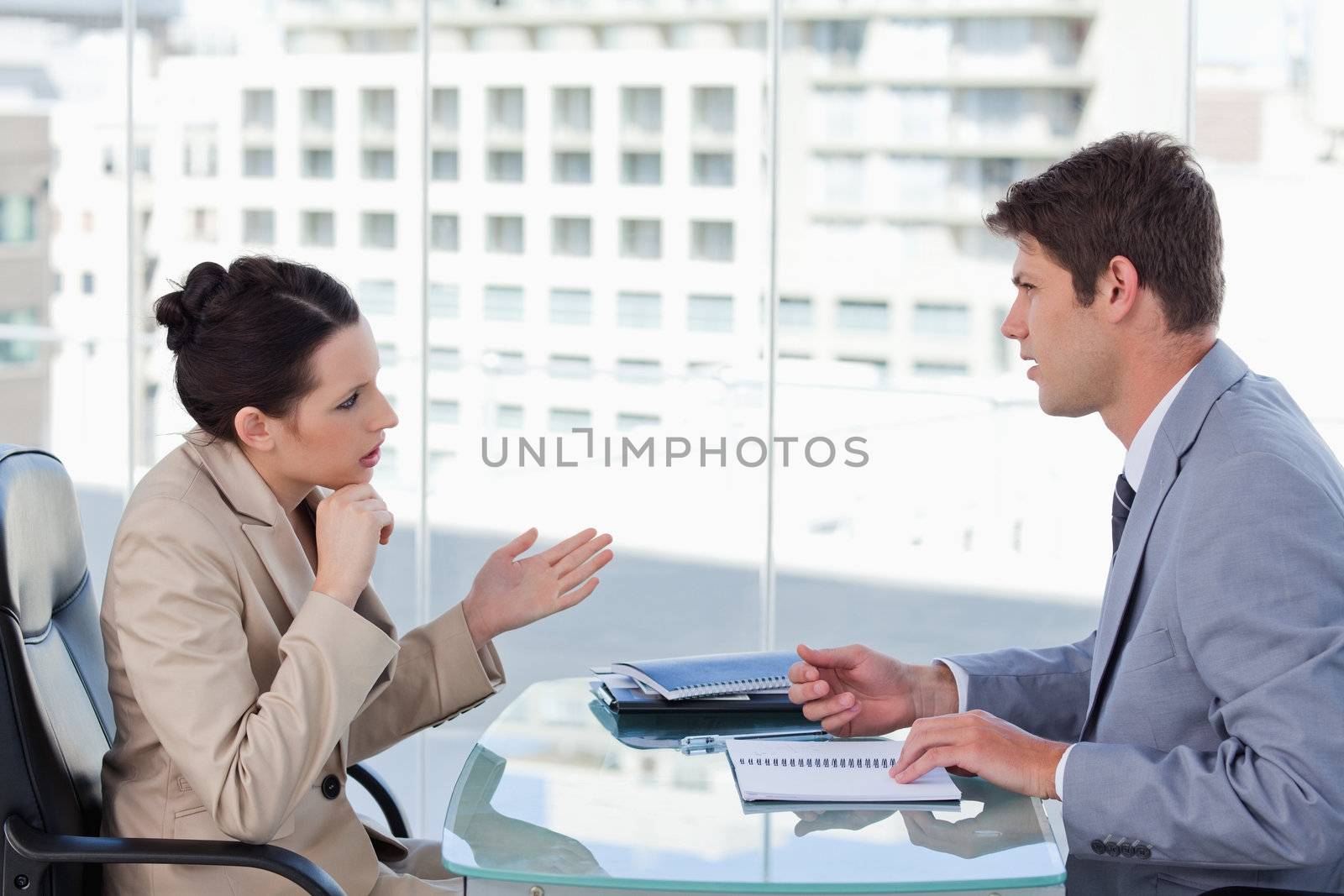 Serious business team during a brainstorming in a meeting room