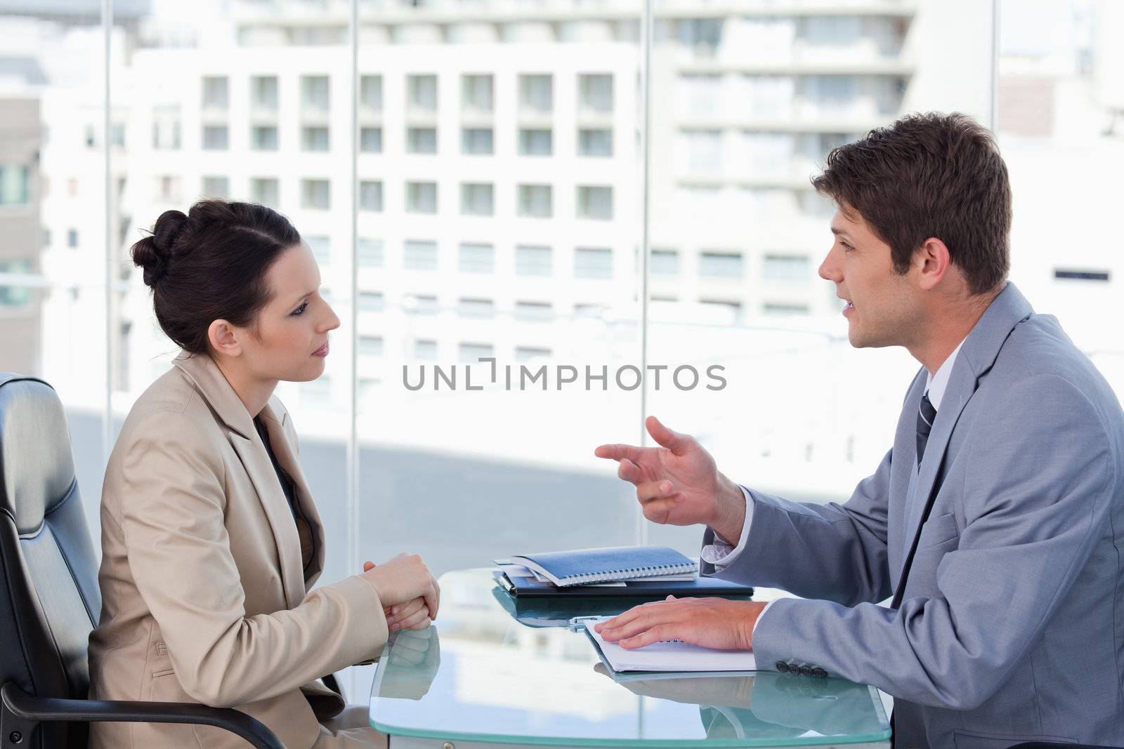 Young business team during a brainstorming in a meeting room