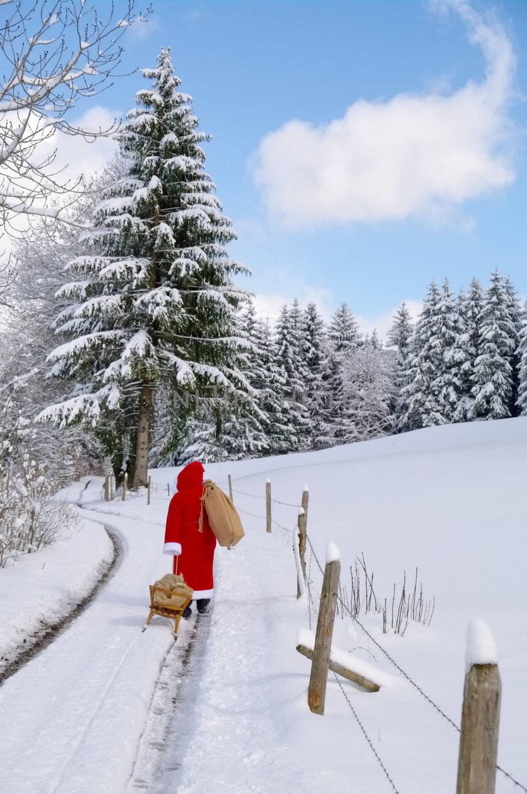 Santa Claus, Father Christmas in a beautiful winter landscape