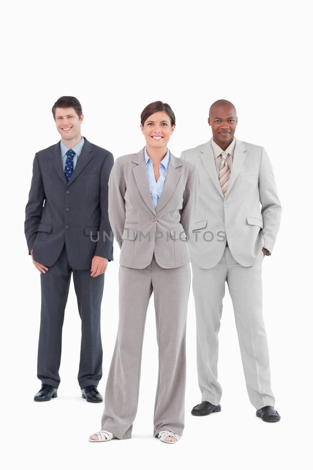 Salesteam standing together against a white background