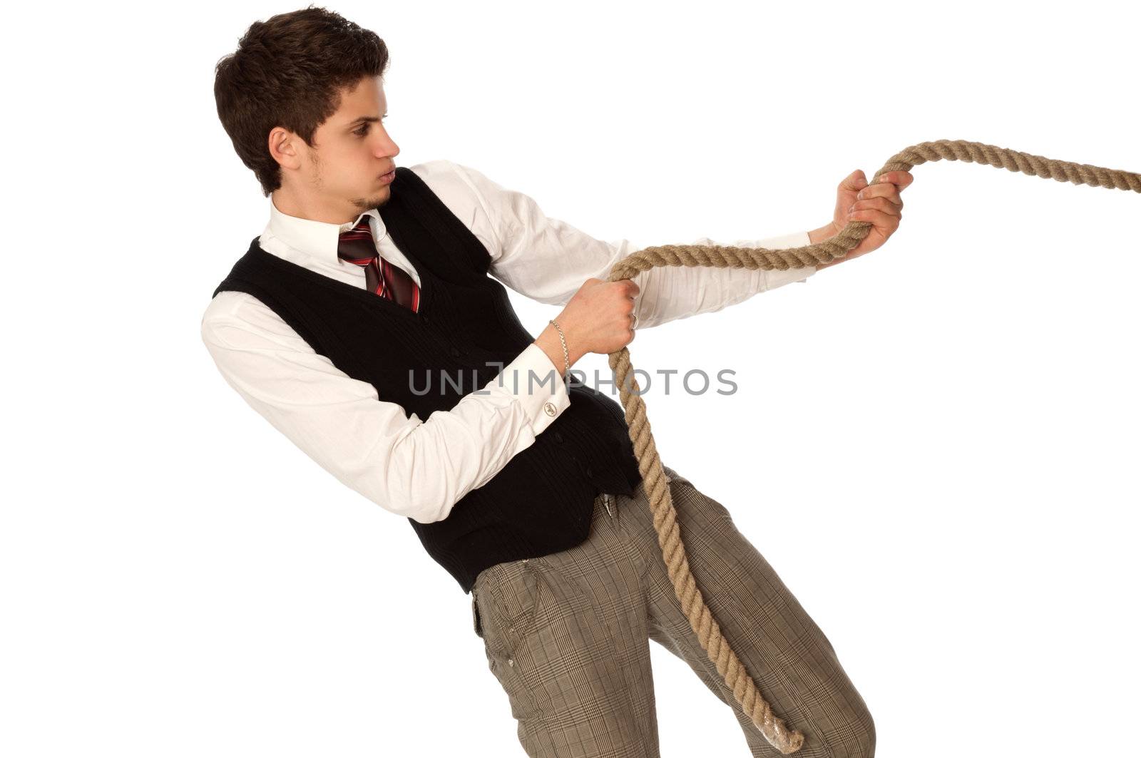 strong-willed man pulling of a rope and wins as a symbol of business success